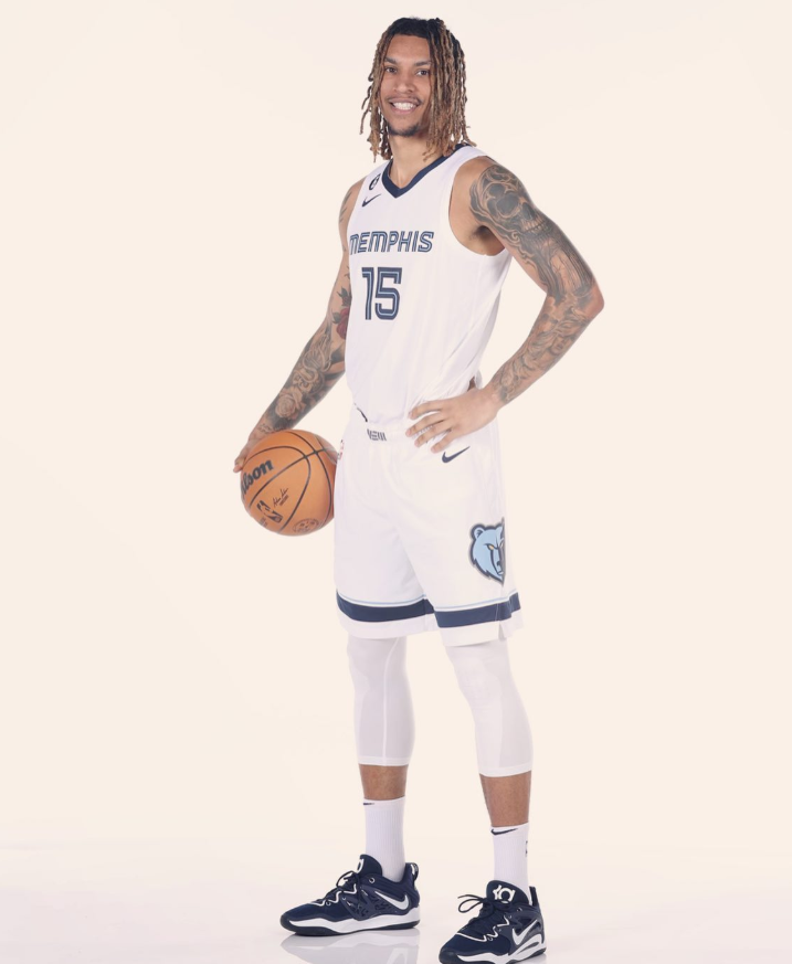Brandon Clarke poses in his Memphis Grizzlies uniform while holding a basketball during a studio photoshoot. | Source: Instagram/brandon_clarke23