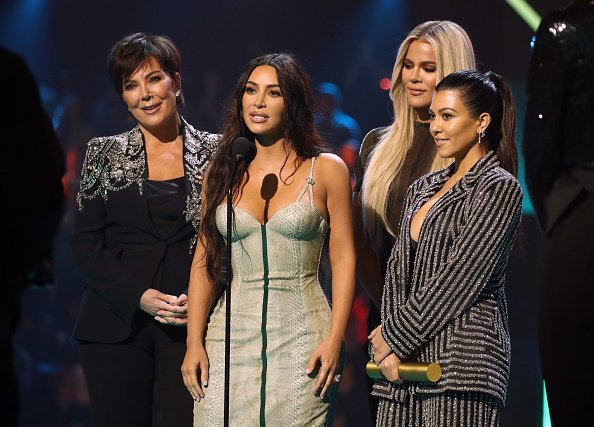 Kris Jenner, Kim Kardashian, Khloé Kardashian, and Kourtney Kardashian accept The Reality Show of 2019 for 'Keeping Up with the Kardashians' on stage during the 2019 E! People's Choice Awards held at the Barker Hangar on November 10, 2019 | Photo: Getty Images