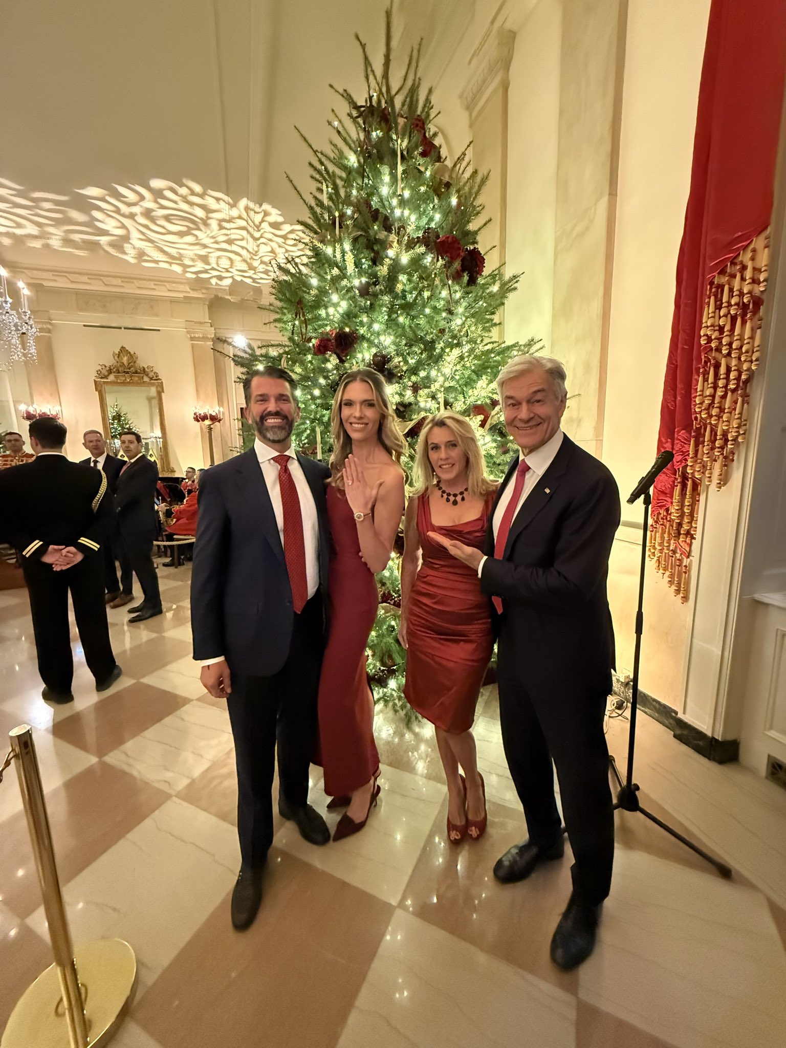 Dr. Memet Oz and his wife Liza Oz with Donald Trump Jr. and his fiancée Bettina Anderson at the White House holiday event on December 15, 2025 | Source: X/DrOz
