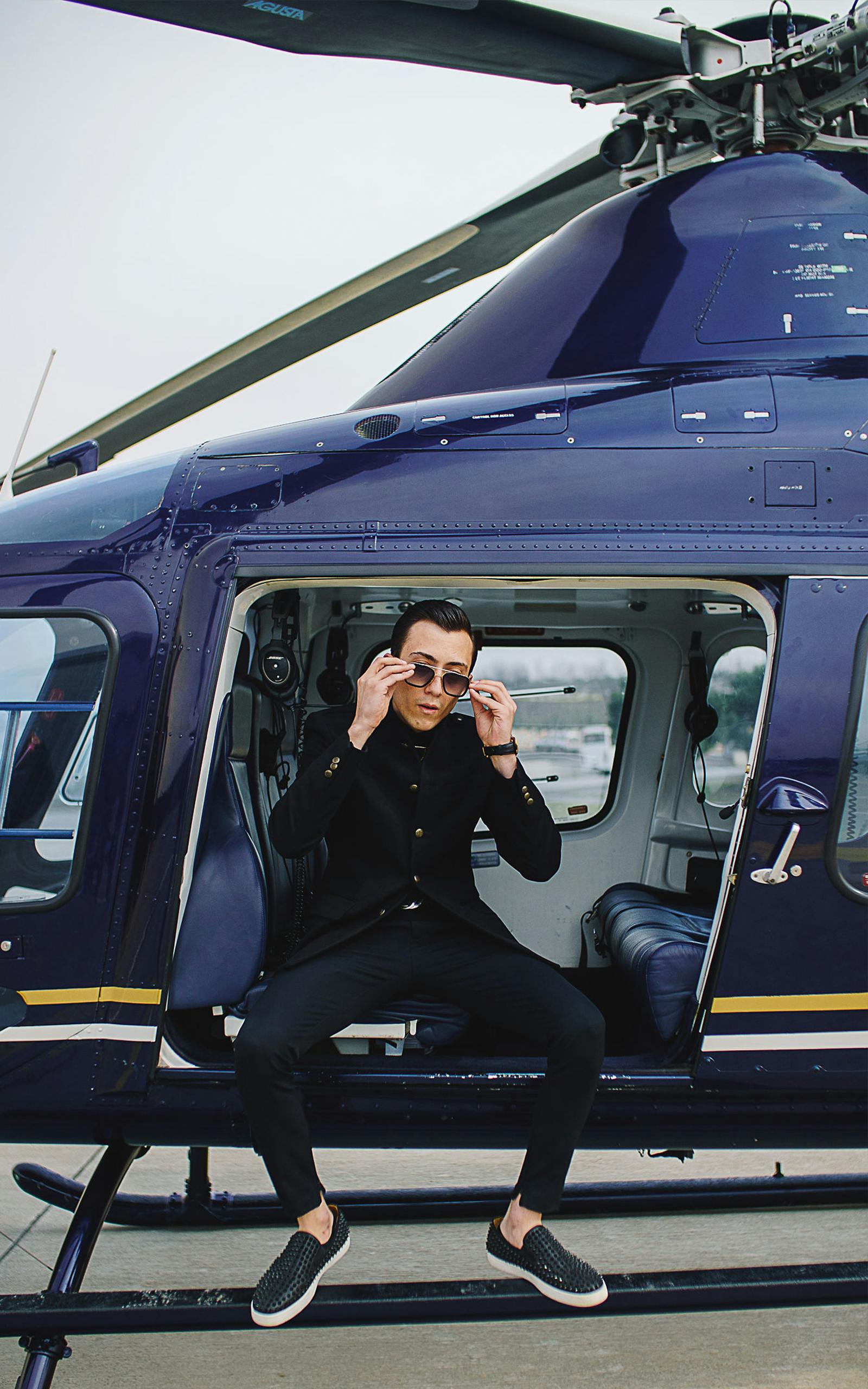 A rich young man inn a helicopter | Source: Pexels
