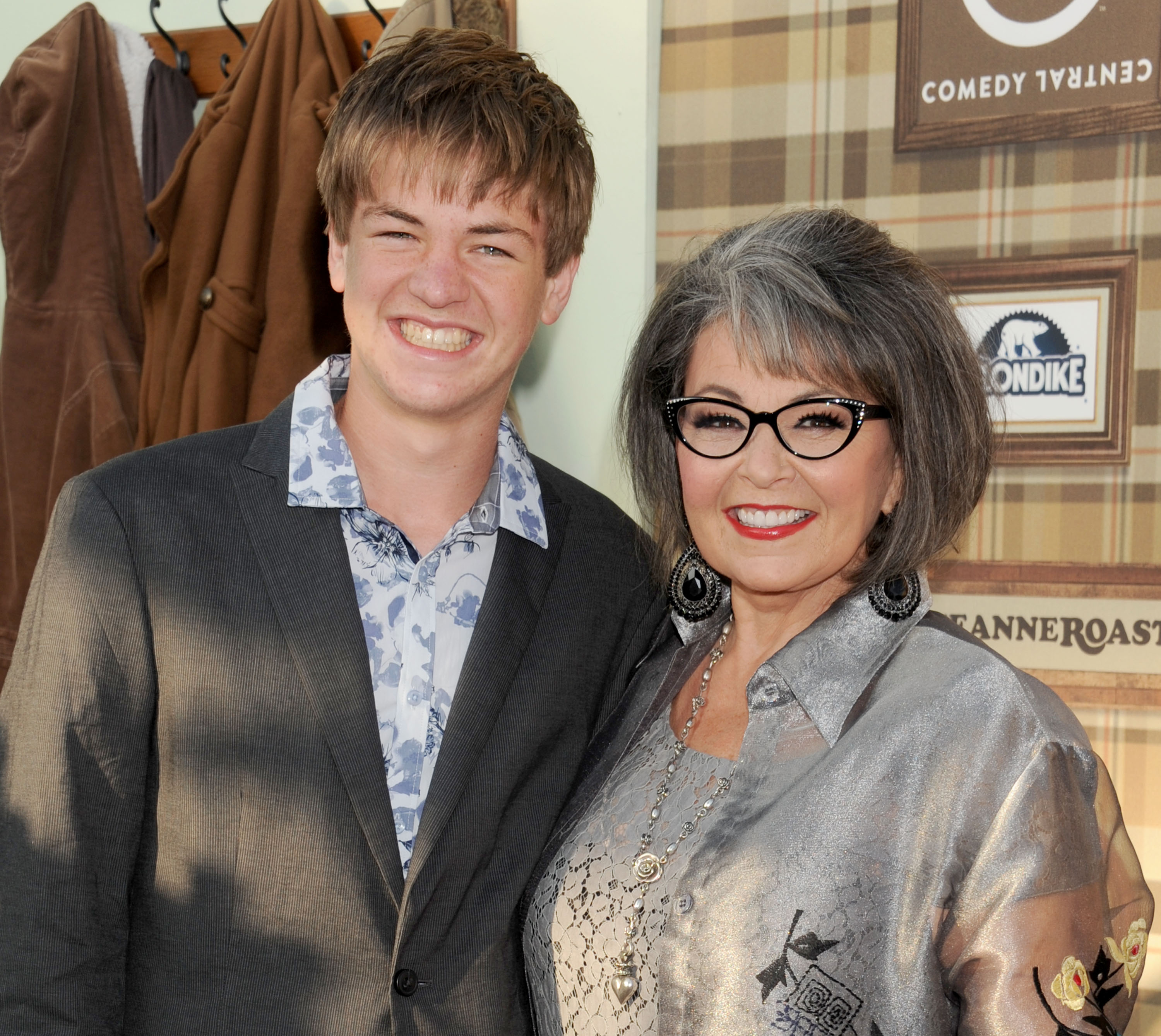 Actress Roseanne Barr (R) and son Buck Thomas arrive at the Comedy Central Roast of Roseanne Barr at Hollywood Palladium on August 4, 2012 in Hollywood, California. | Source: Getty Images
