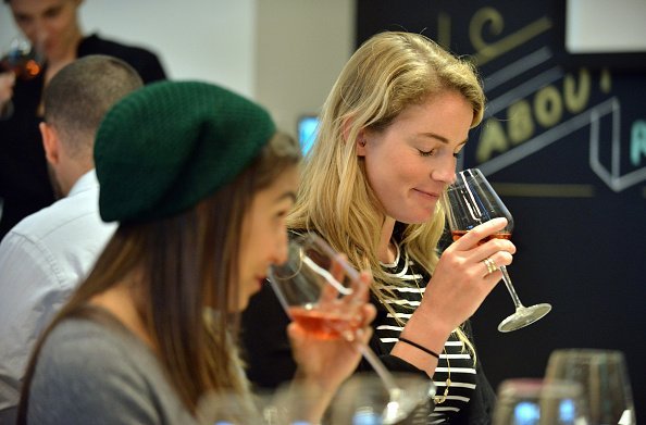 Photo of two young ladies having a drink | Photo: Getty Images