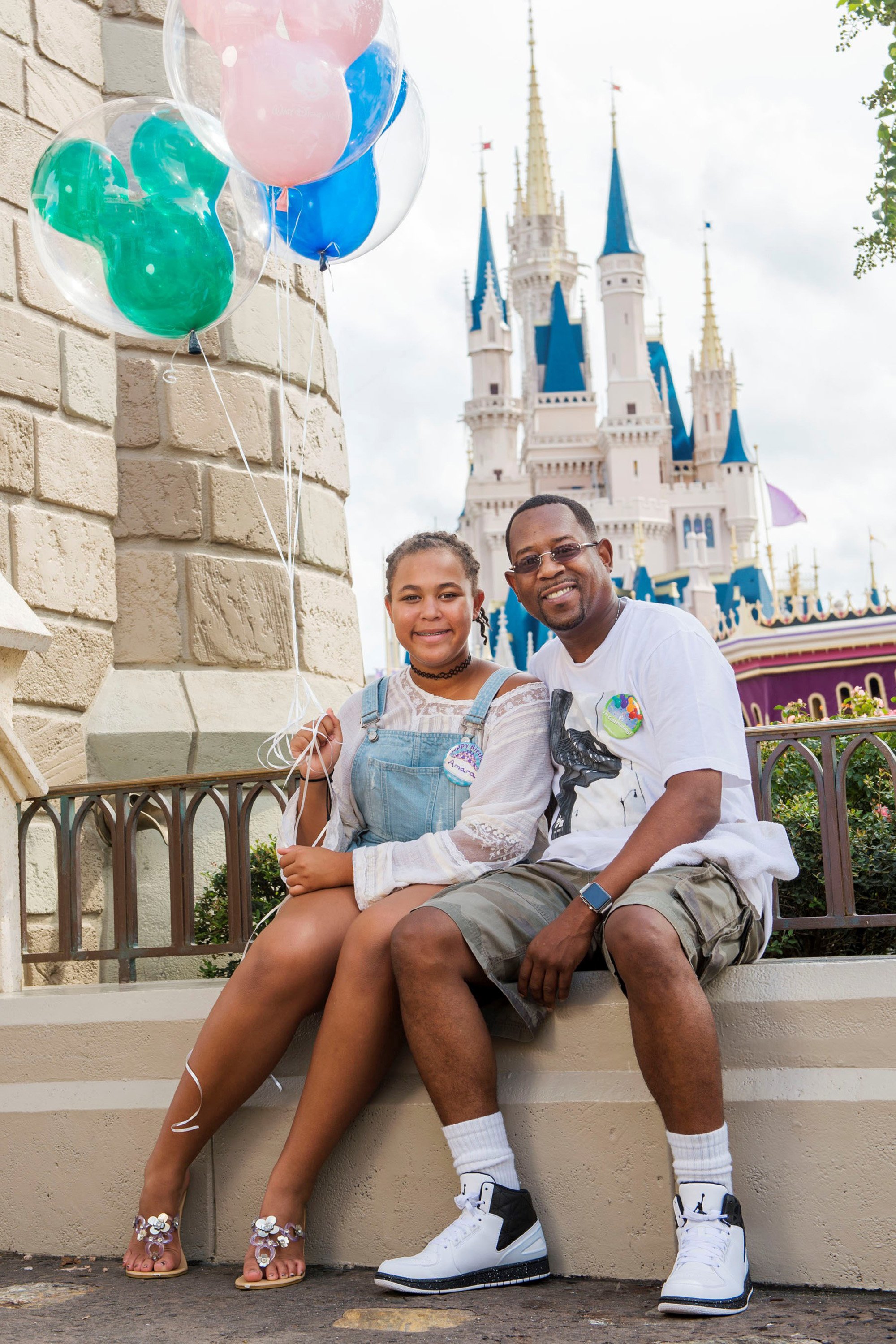 Actor Martin Lawrence, and his daughter, Amara Lawrence, are seen celebrating Amara's 13th birthday at Magic Kingdom park, Florida, on September 14, 2015. | Source: Getty Images