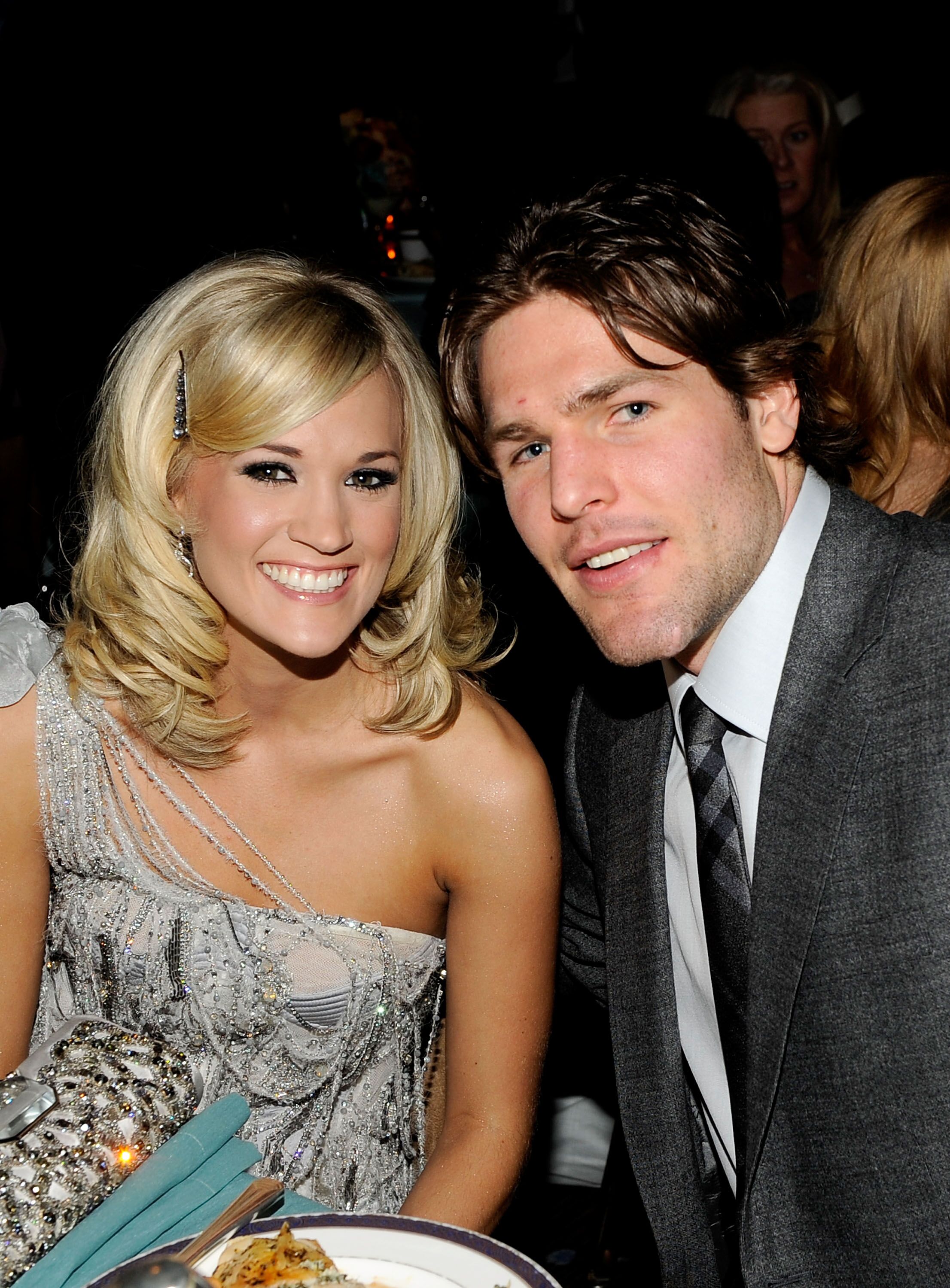 Carrie Underwood and Mike Fisher during the 52nd Annual GRAMMY Awards. | Source: Getty Images
