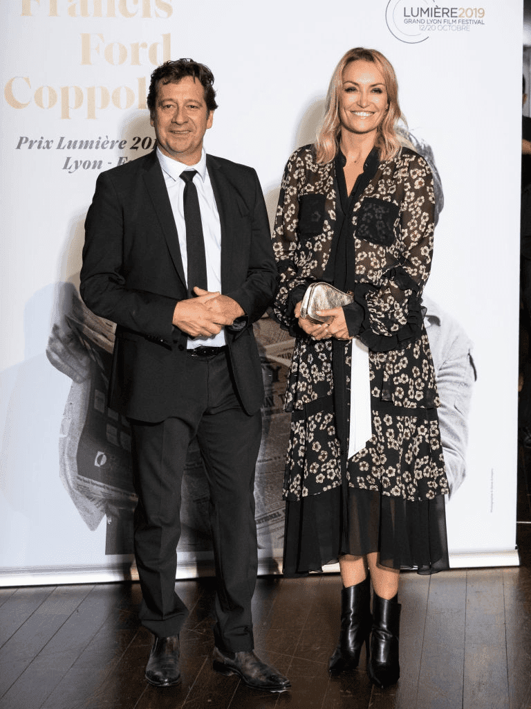 Laurent Gerra et Christelle Bardet assistent à l'hommage à Francis Ford Coppola lors du 11ème Festival du Film Lumière le 18 octobre 2019 à Lyon, France. | Photo : Getty Images
