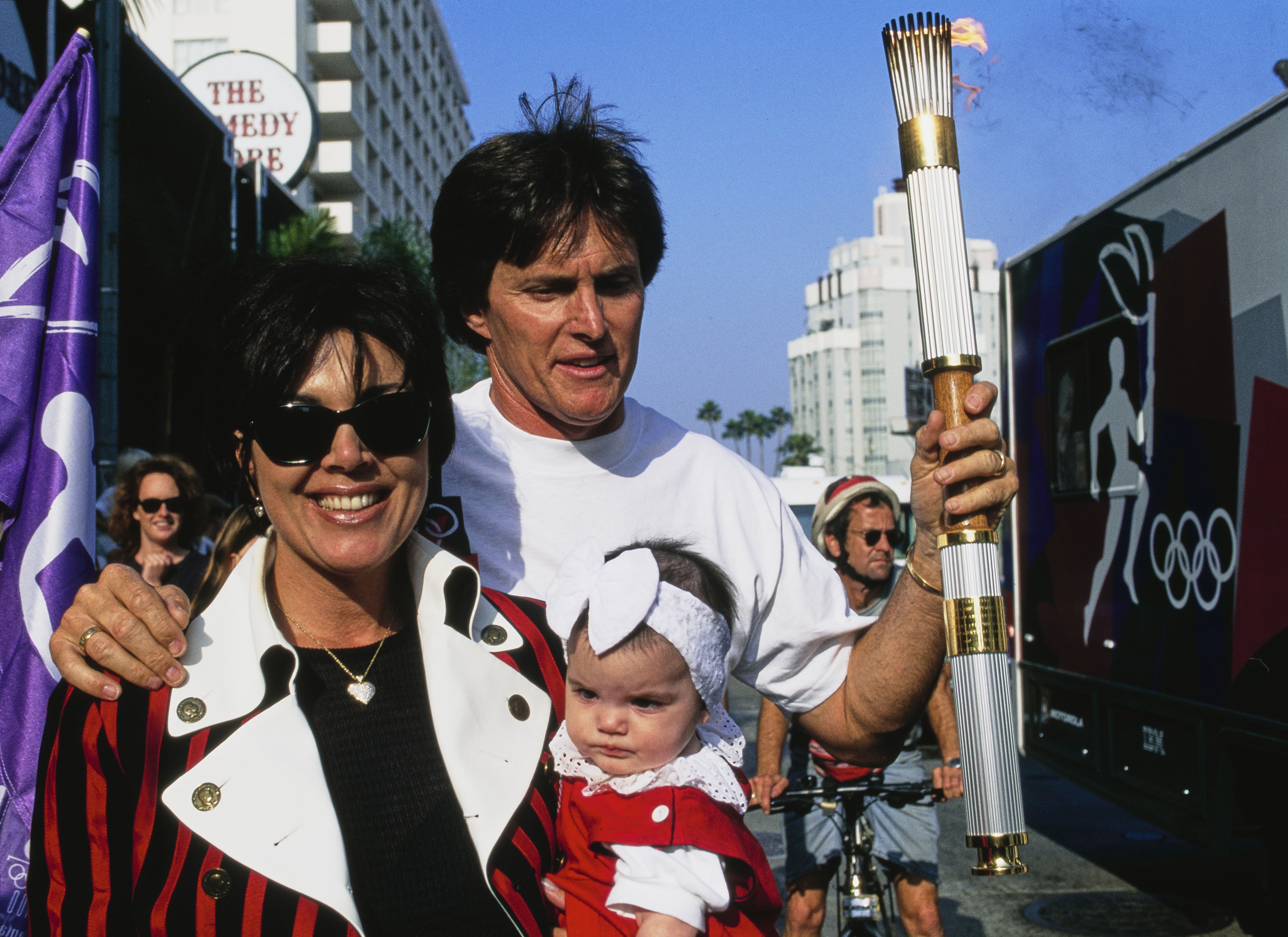 Bruce Jenner with his then-wife Kris Kardashian and daughter Kendall Jenner during the torch relay for the XXVI Summer Olympic Games on April 17, 1996 in Los Angeles, California | Source: Getty Images