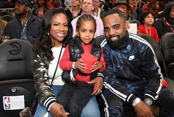 Kandi Burruss with her husband, Todd Tucker and their son, Ace Wells Tucker watching a game between the Denver Nuggets and the Atlanta Hawks in January 2020. | Photo: Getty Images