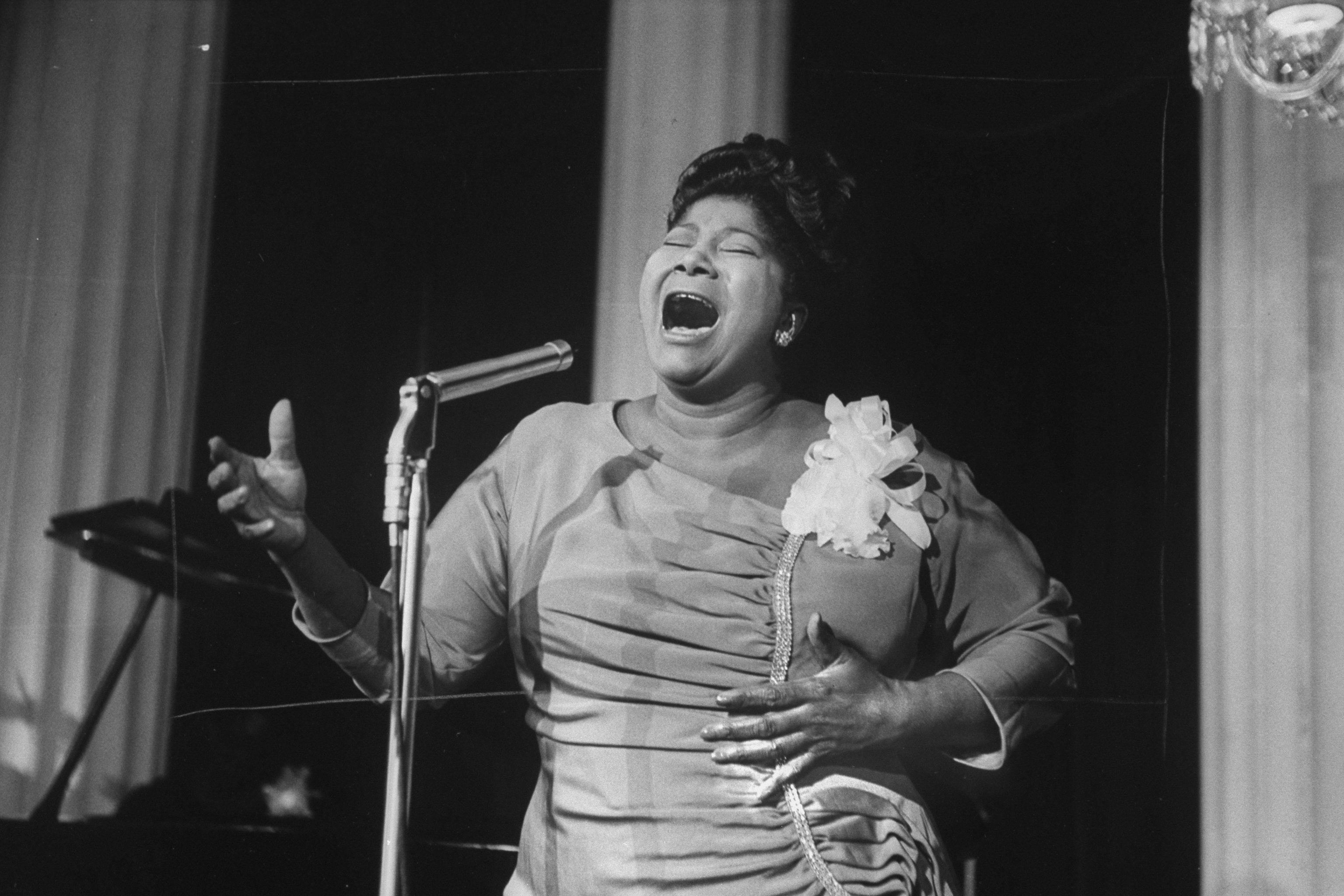 Singer Mahalia Jackson singing at a reception in a hotel. | Photo by Don Cravens/The LIFE Images Collection via Getty Images
