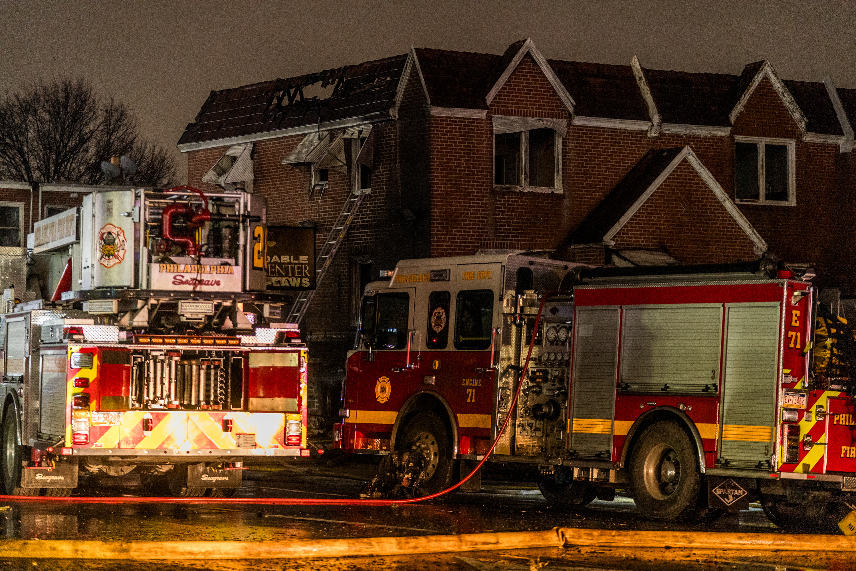 View of a home's roof hit by a small plane that crashes in a Philadelphia | Source: Getty Images