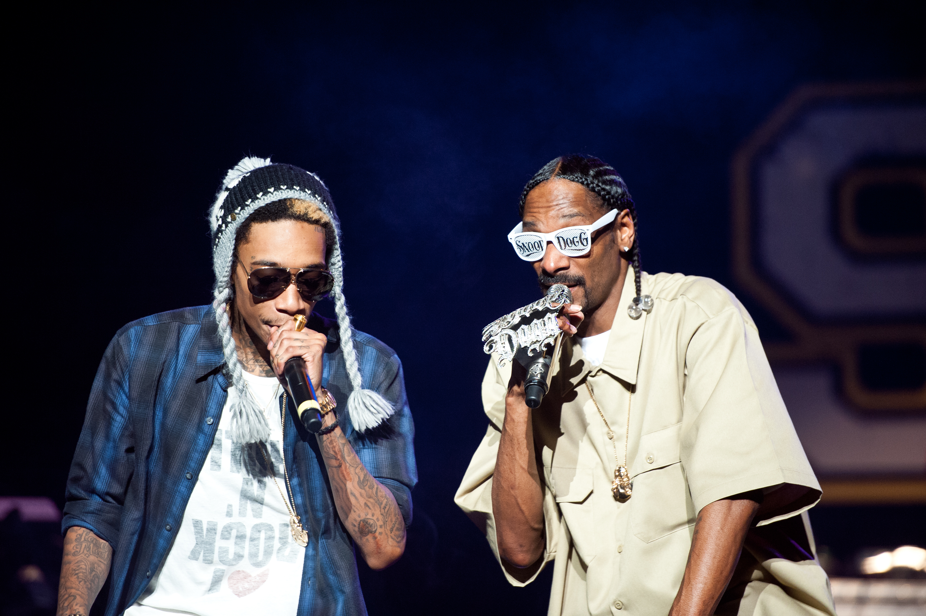 Wiz Khalifa and Snoop Dogg perform at the Wiltern on December 13, 2011, in Los Angeles, California. | Source: Getty Images