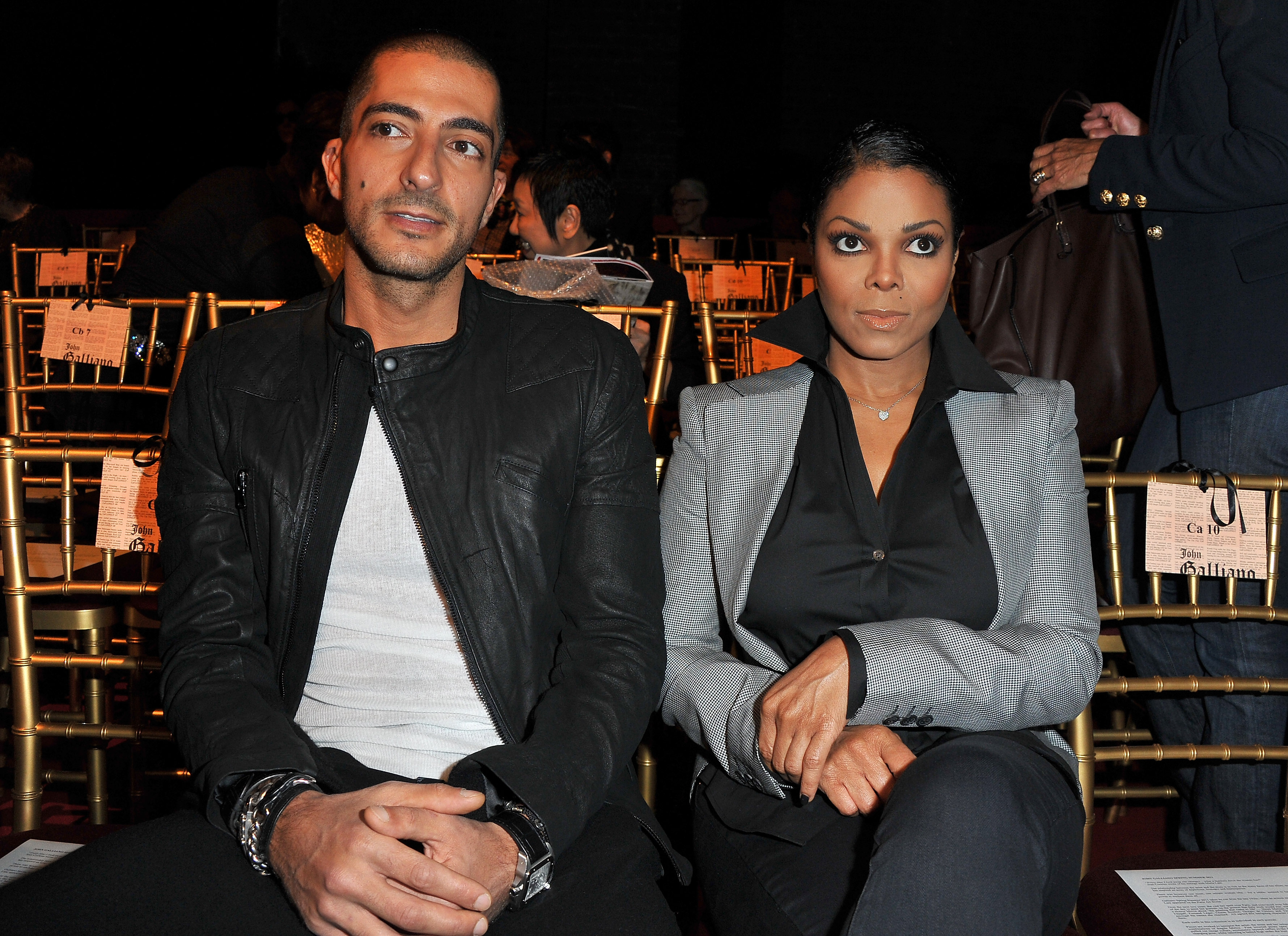 Wissam Al Mana and Janet Jackson attend the John Galliano Ready to Wear Spring/Summer 2011 show in Paris, France, on October 3, 2010. | Source: Getty Images
