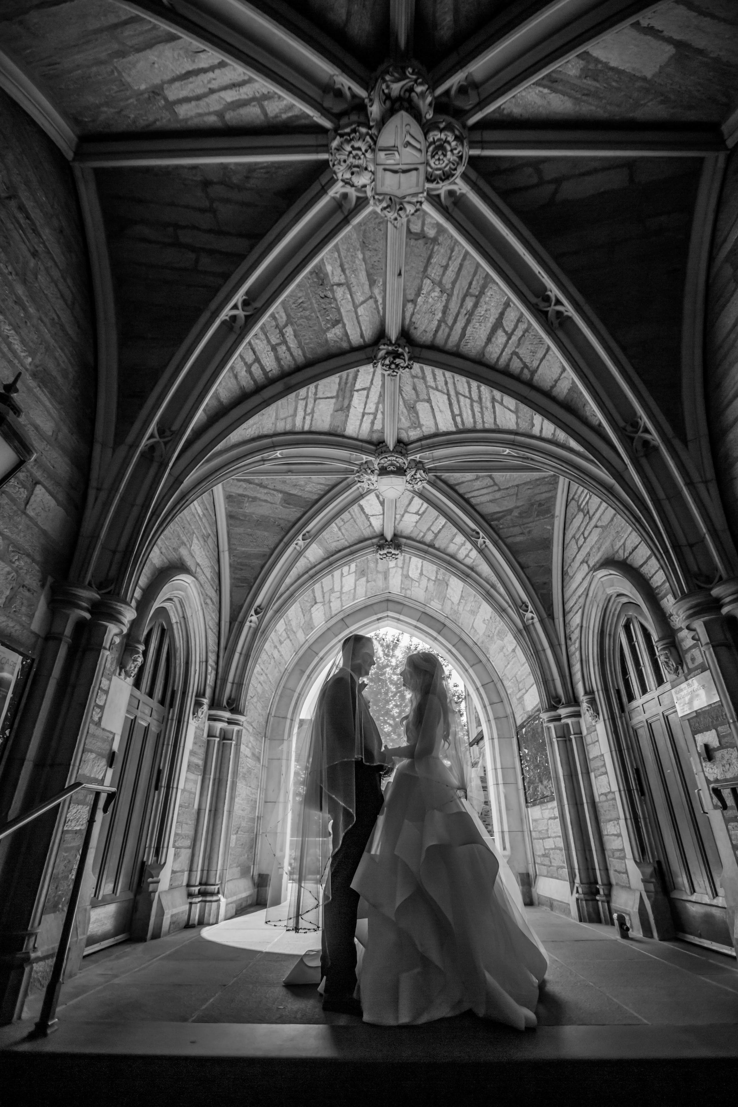 A bride and groom standing at their wedding venue | Source: Pexels