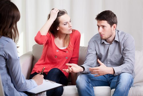 A couple talking to a therapist. | Source: Shutterstock.