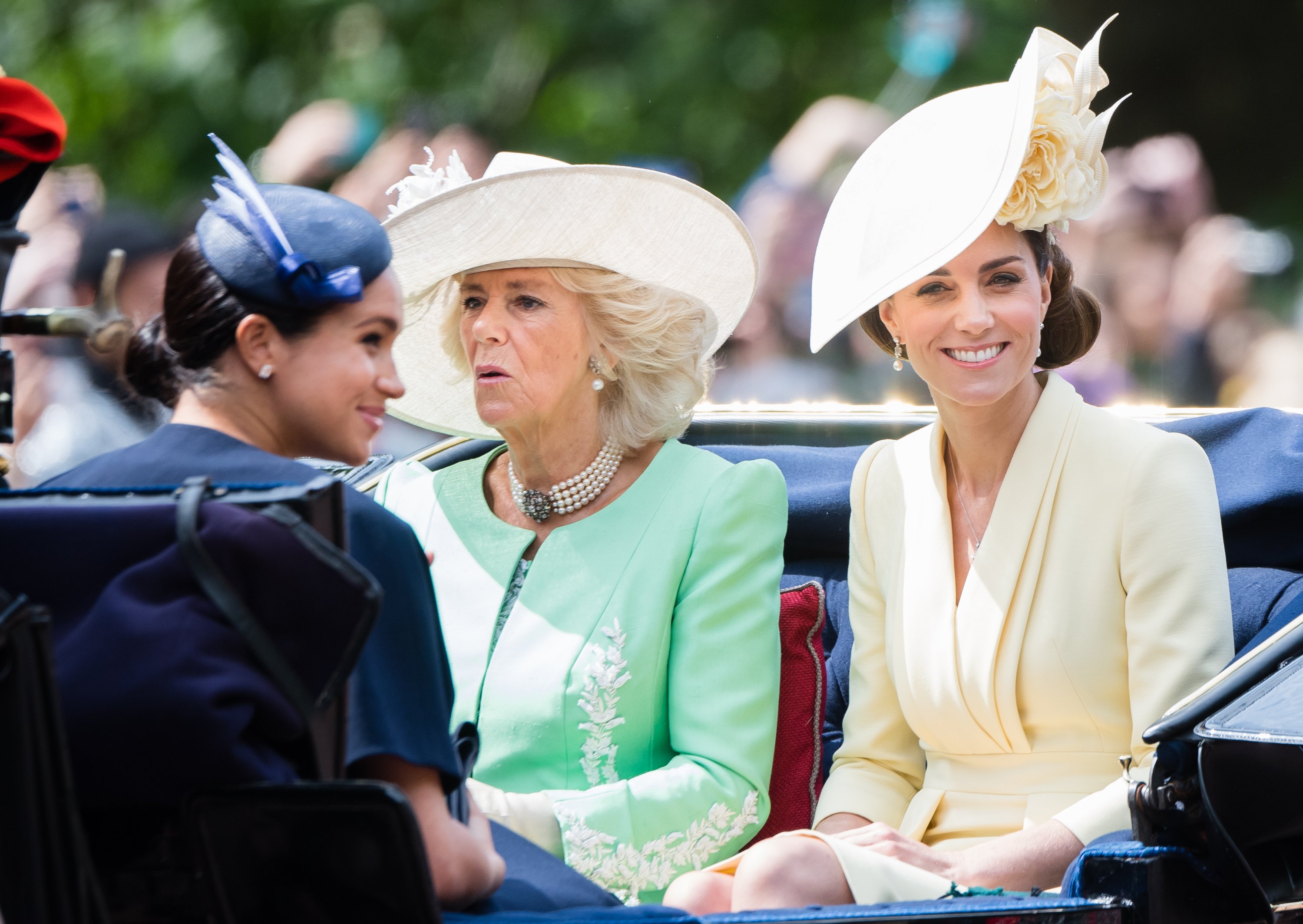 Duchess Meghan, Duchess Camilla and Duchess Kate ride a carriage down The Mall during Trooping The Color on June 8, 2019 in London, England.  |  Source: Getty Images