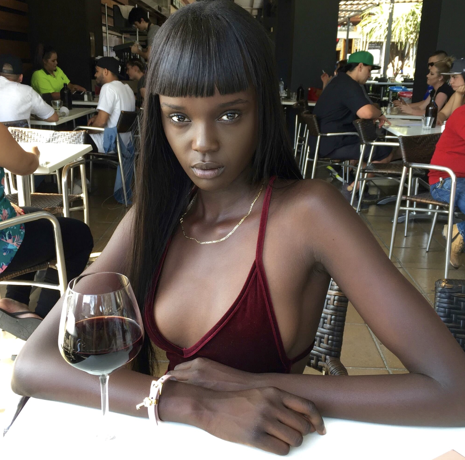 Nyadak "Duckie" Thot posing in a candid photo uploaded on April 25, 2017, in West Hollywood, California | Source: X/duckiethot