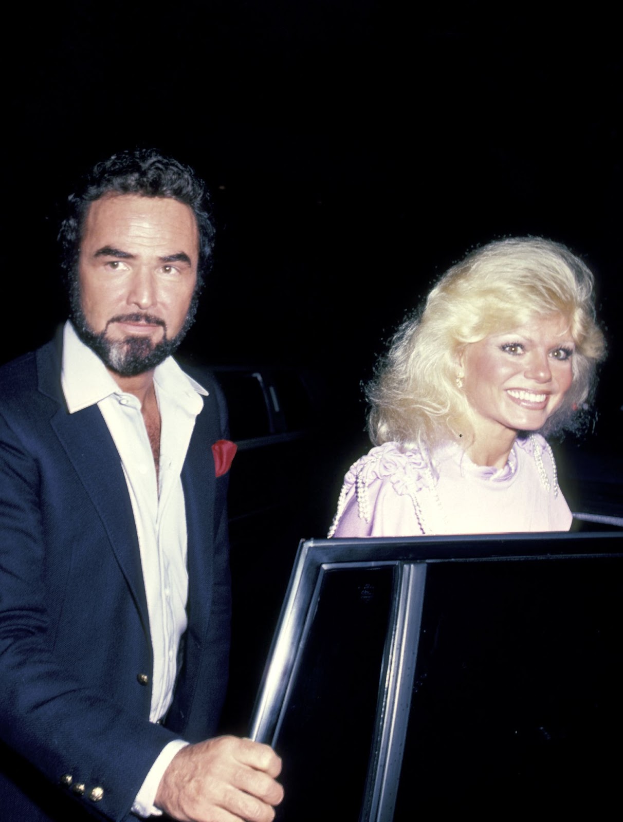 Burt Reynolds and the famous actress at Sammy Davis Jr.'s concert on April 26, 1983, in Beverly Hills, California. | Source: Getty Images