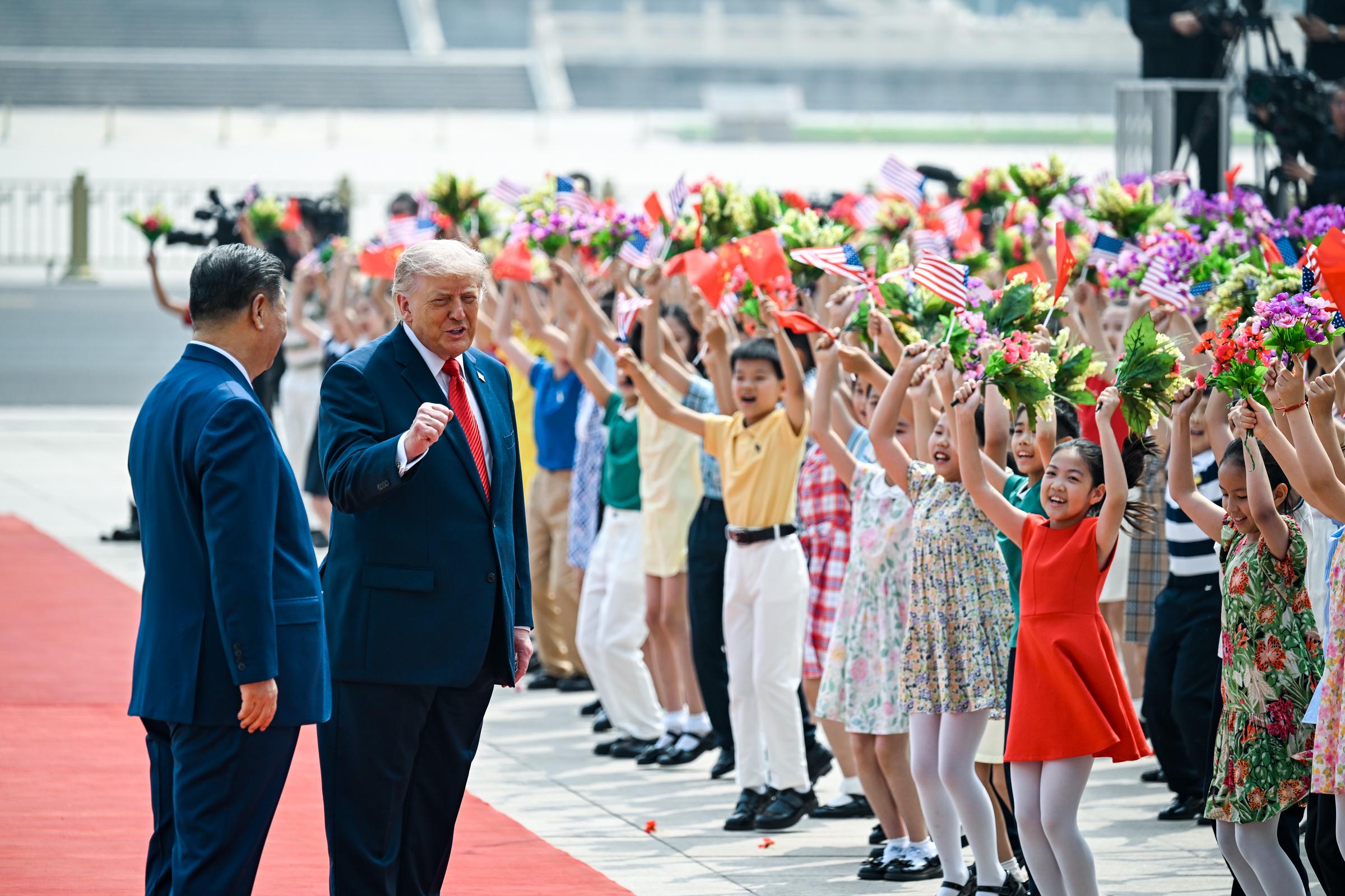 President Donald Trump and President Xi Jinping participate in a welcoming ceremony at the Great Hall of the People in Beijing, China on May 14, 2026. | Source: Getty Images