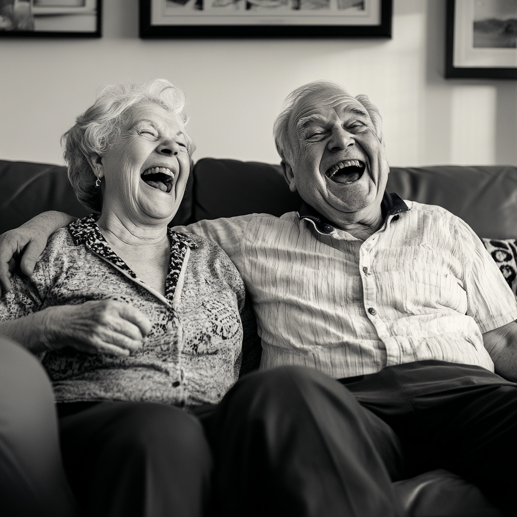 An elderly pair laughing loudly | Source: Midjourney