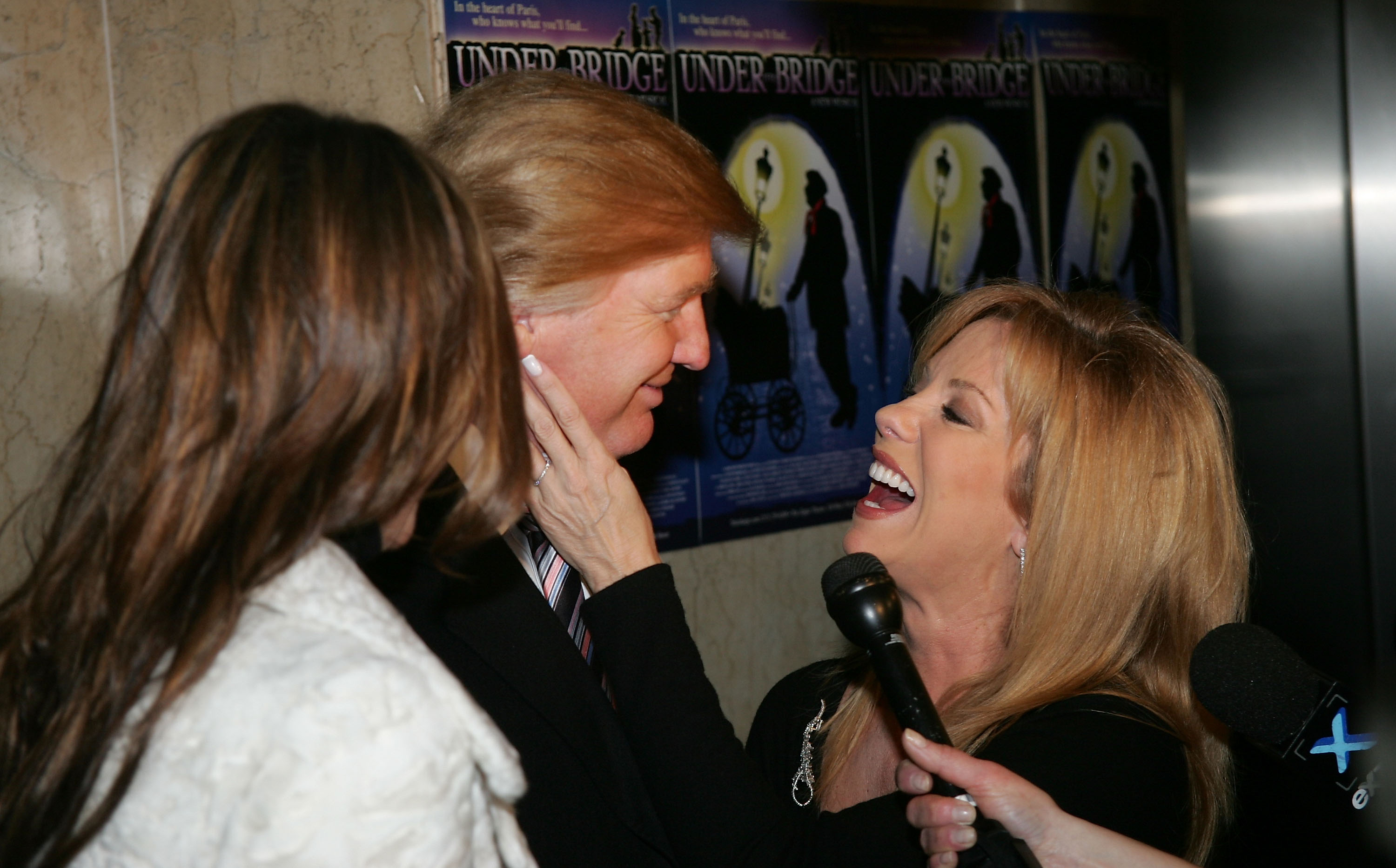 Donald and Melania Trump with Kathie Lee Gifford at the opening night of the musical "Under The Bridge" at The Zipper Theatre January 6, 2005, in New York. | Source: Getty Images