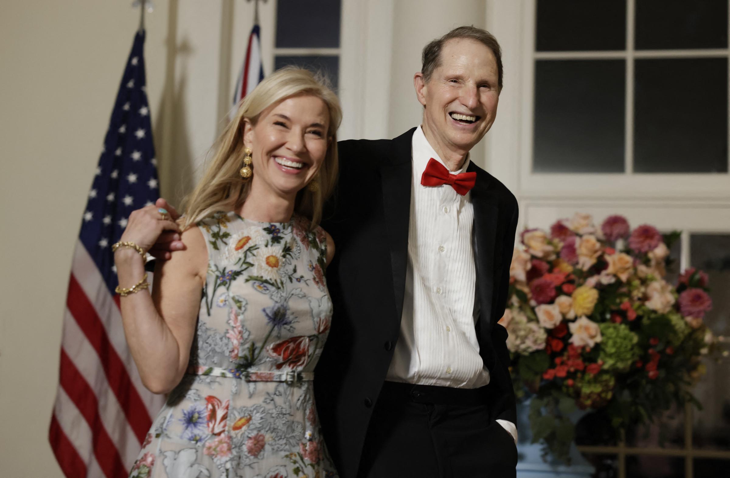 Senator Ron Wyden (D-OR) and his wife, Nancy Wyden, arrive for a State Dinner in honor of Australia's Prime Minister Anthony Albanese and Jodie Haydon, at the Booksellers Room of the White House on October 25, 2023, in Washington, DC. | Source: Getty Images