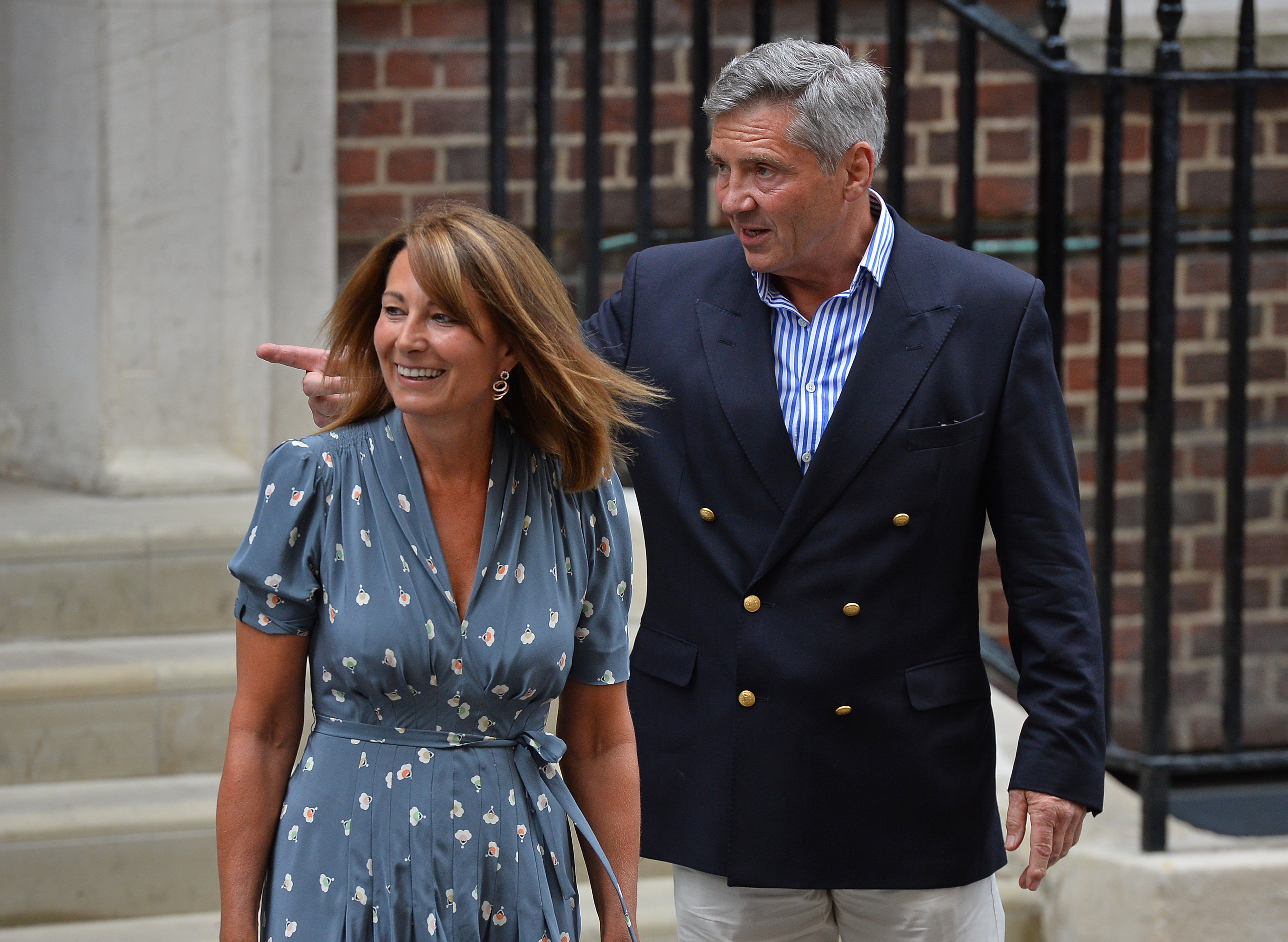 Carole and Michael Middleton leaving the St Mary's Hospital after the Princess of Wales had just given birth in 2013 | Source: Getty Images