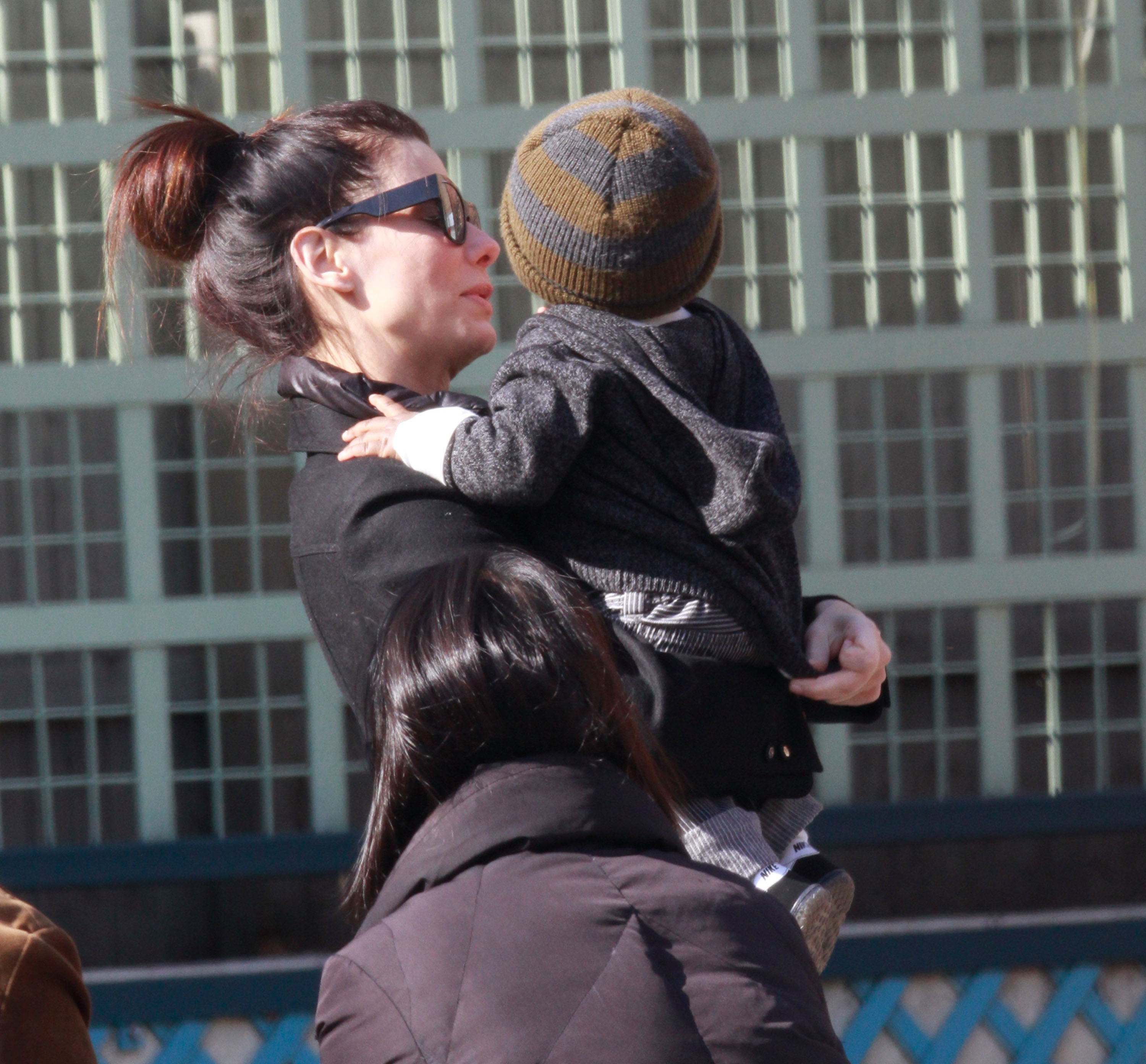 Sandra and Louis Bullock are seen on the streets of Manhattan on March 20, 2011 in New York City | Source: Getty Images