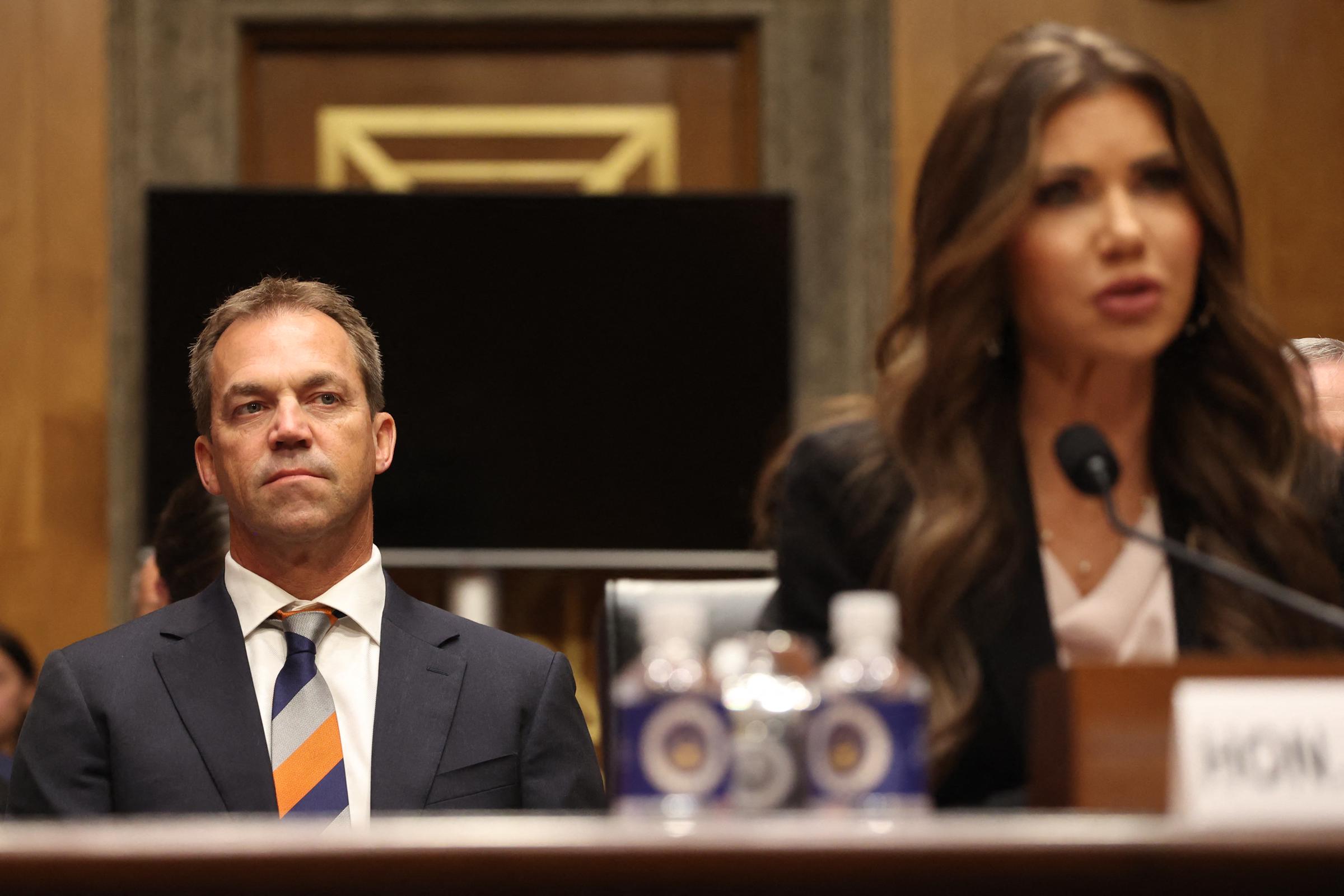 Bryon Noem listens as Kristi testifies before the Senate Committee on May 20, 2025 | Source: Getty Images