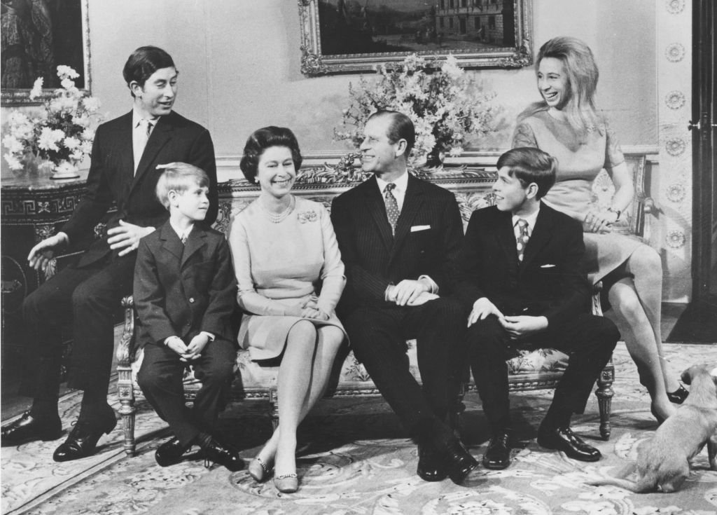 Queen Elizabeth II and the Duke of Edinburgh with their children (left to right); Charles, Prince of Wales, Prince Edward, Prince Andrew, Princess Anne celebrating their silver wedding anniversary at Buckingham Palace | Photo: Getty Images