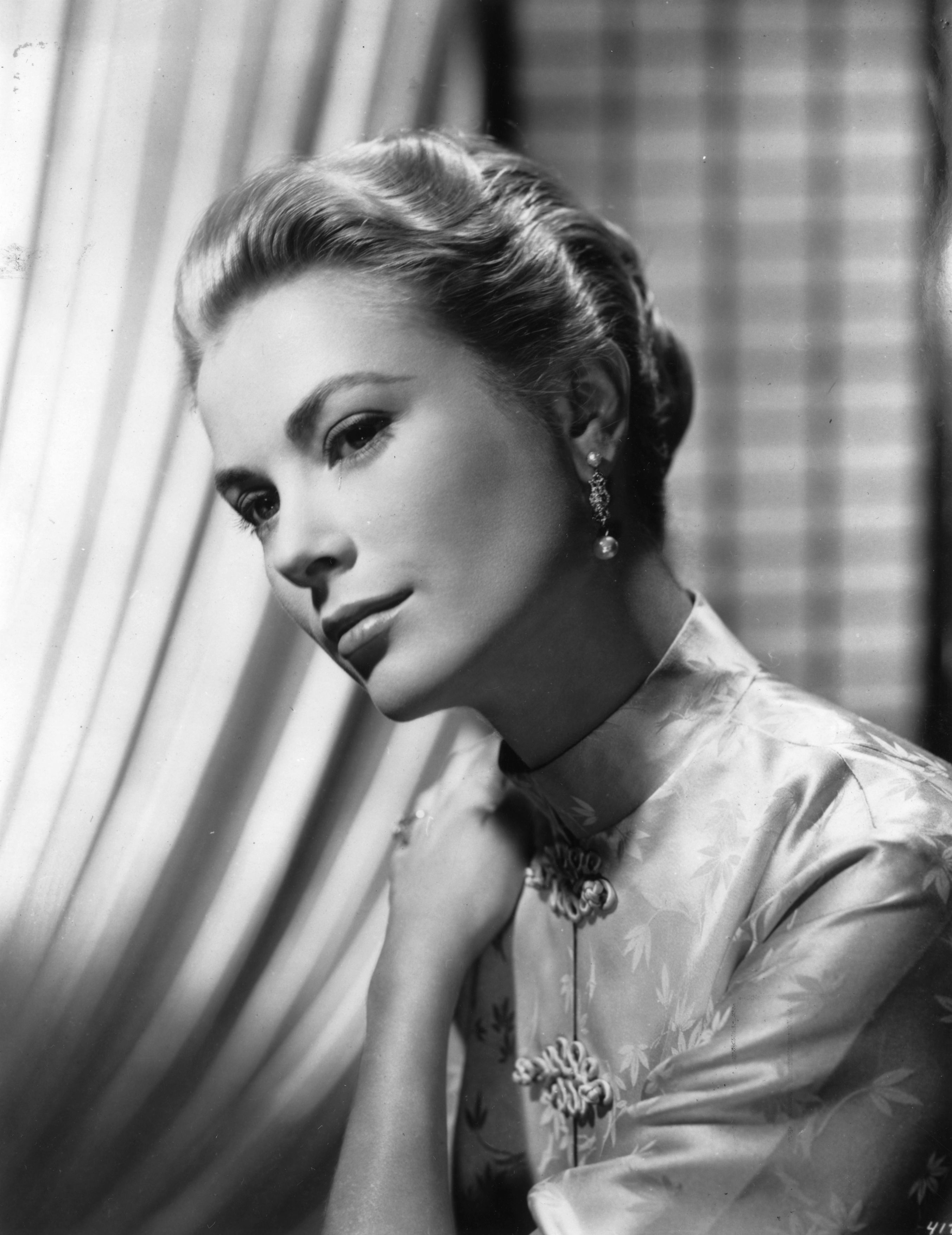 Grace Patricia Kelly, later known as Princess Grace of Monaco, in a black-and-white image on March 8, 1956. | Source: Keystone/Getty Images