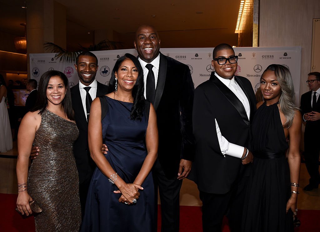 (L-R) Andre’s wife Lisa, Andre, Cookie, Magic Johnson, EJ, and Elisa at the 2014 Carousel of Hope Ball in Beverly Hills, California on Oct. 11, 2014 | Photo: Getty Images