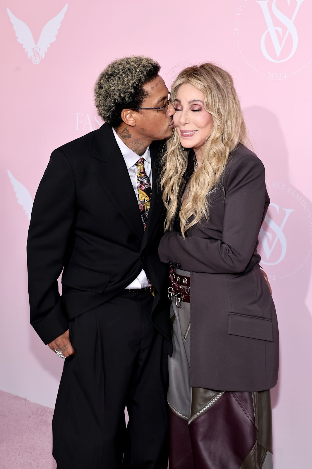 Alexander "AE" Edwards and Cher at the Victoria's Secret 2024 Fashion Show on October 15 in Brooklyn, New York. | Source: Getty Images