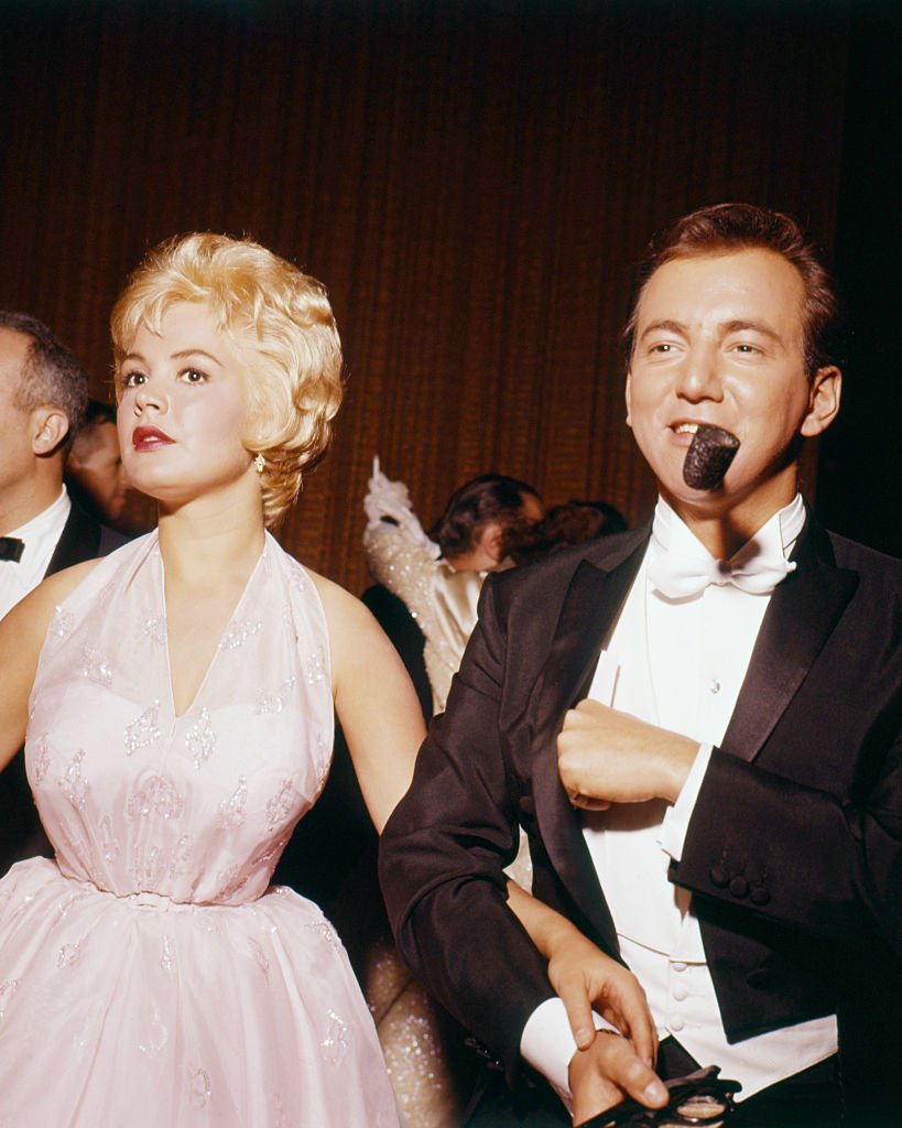 American actor and singer Bobby Darin with his wife, actress Sandra Dee at the 33rd Academy Awards, Santa Monica, California on April 17, 1961. | Photo: Getty Images