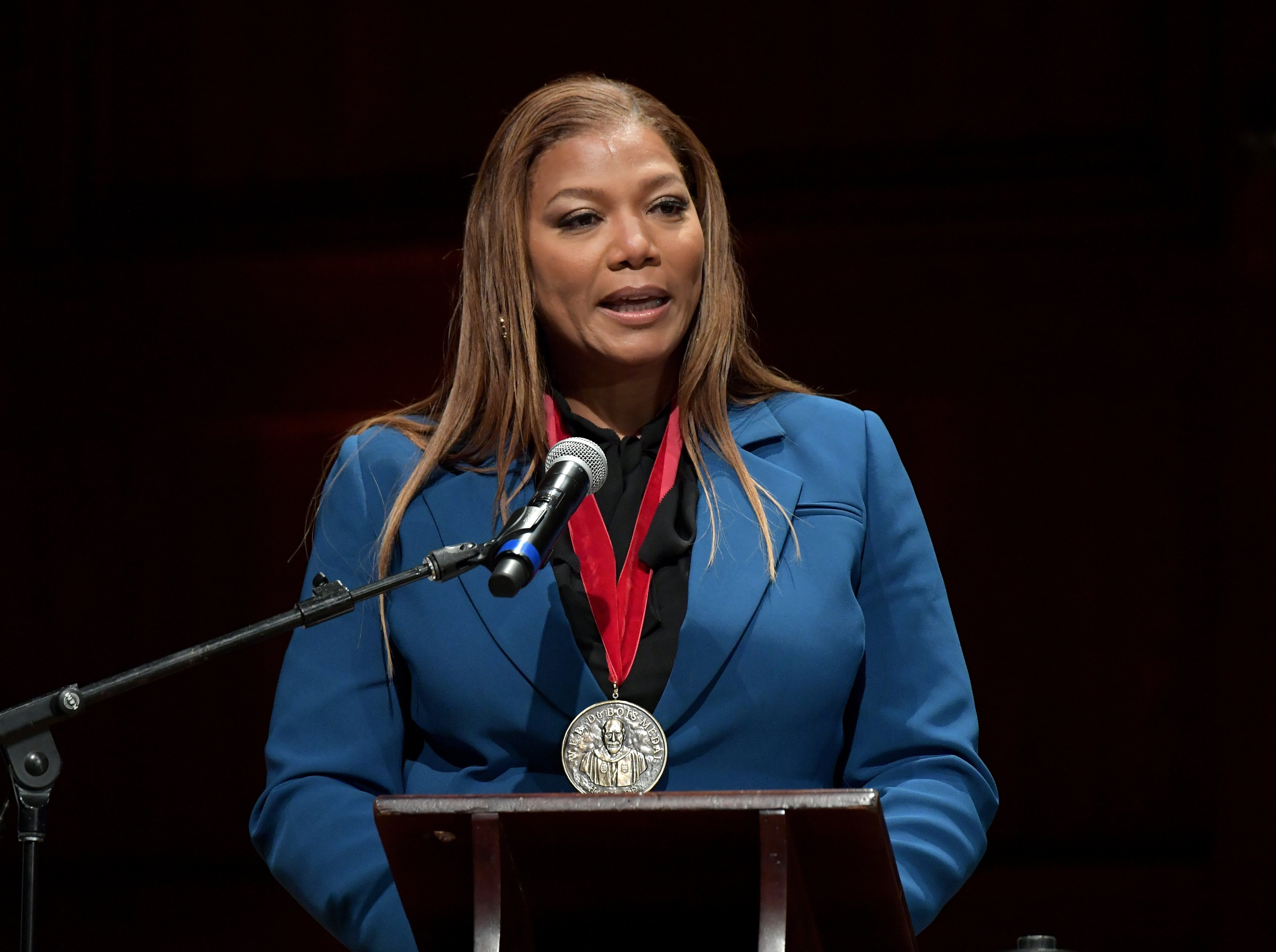 Queen Latifah delivering her powerful acceptance speech at Harvard University. | Photo: Getty Images