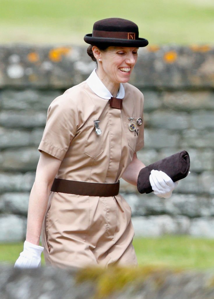 Maria Teresa Borrallo (nounou du prince George de Cambridge et de la princesse Charlotte de Cambridge) assiste au mariage de Pippa Middleton et James Matthews à l'église St Mark le 20 mai 2017 à Englefield Green, Angleterre І Source : Getty Images