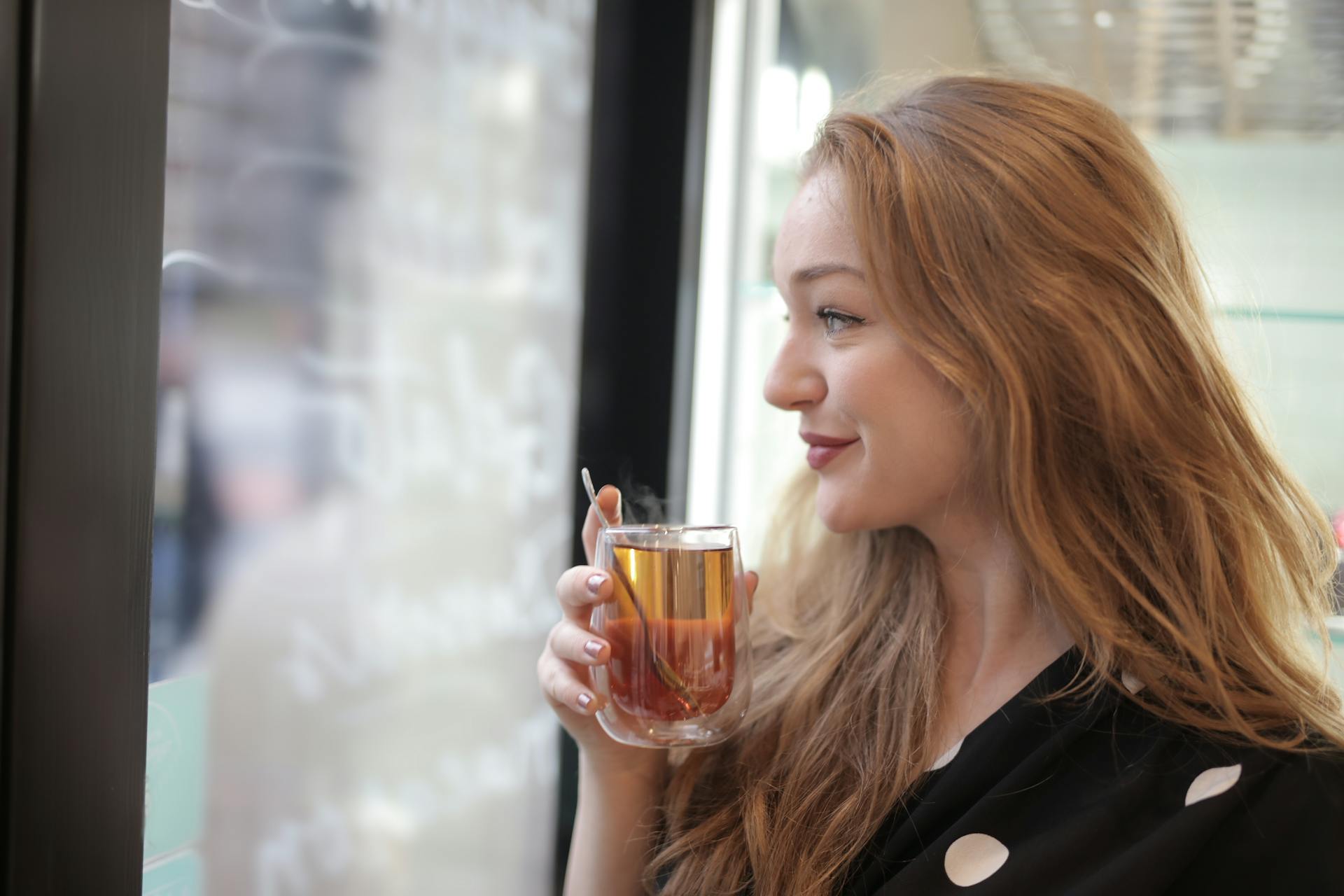 A woman enjoying tea | Source: Pexels