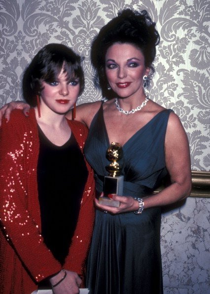 Joan Collins et Percy Gibson, le 14 novembre 2019 à Los Angeles, Californie | Photo : Getty Images