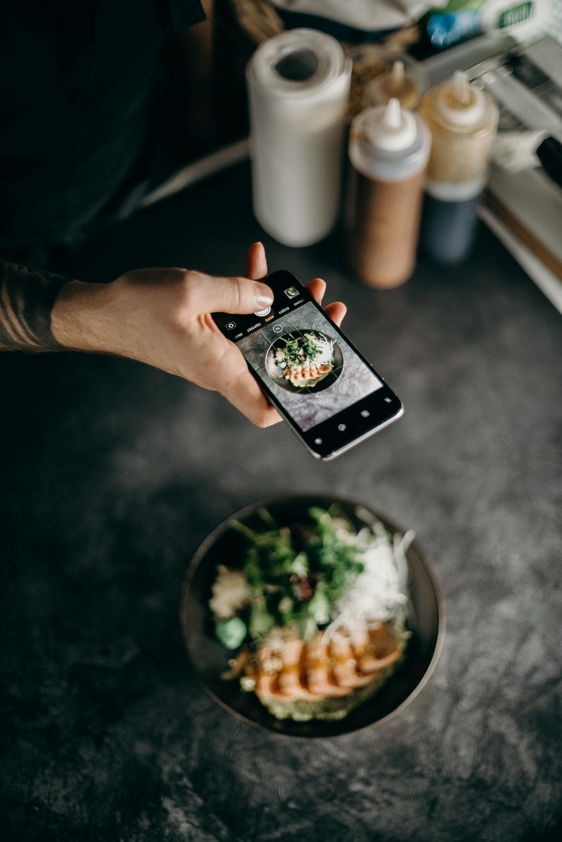 A person taking a photo of food | Source: Pexels