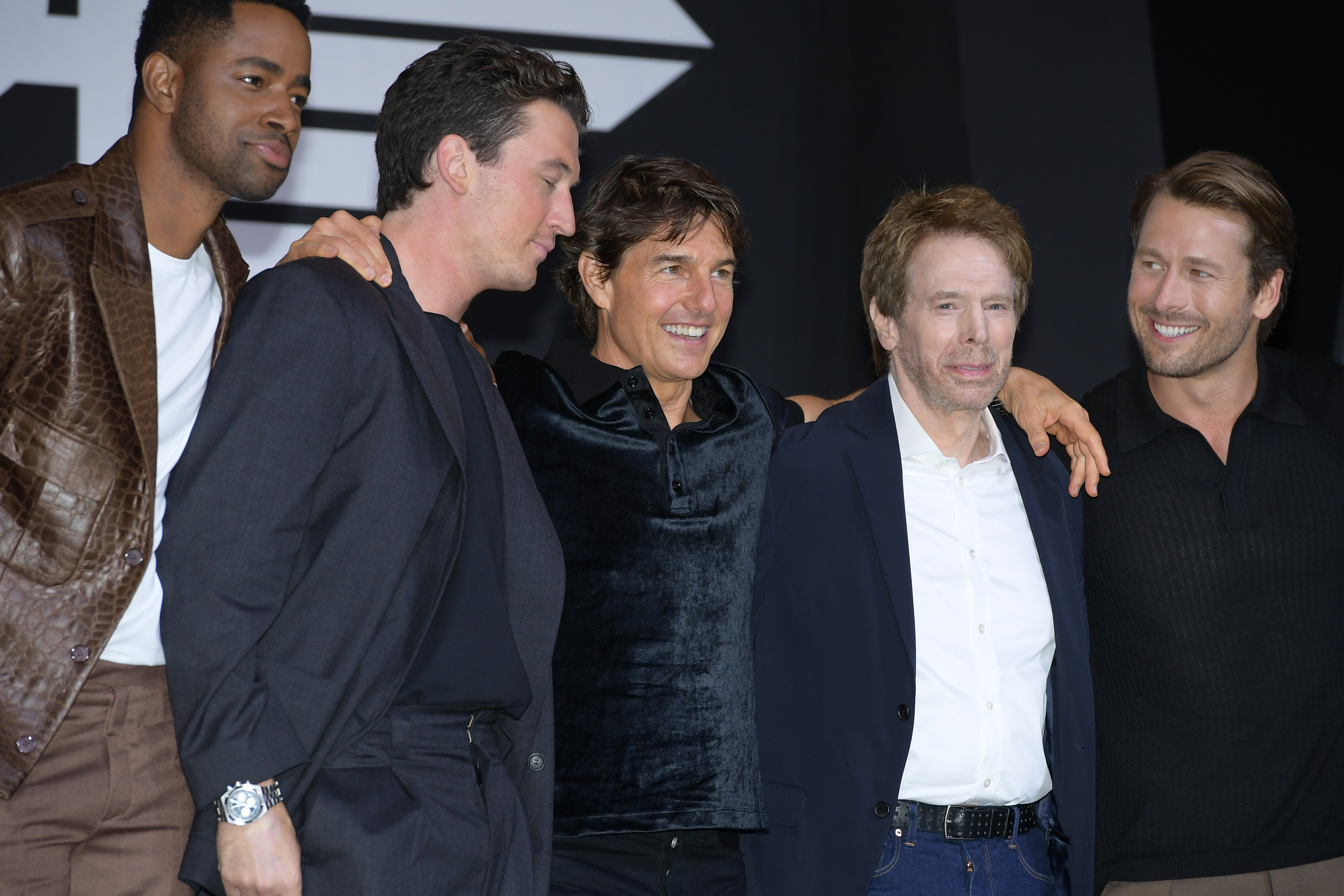 Jay Ellis, Miles Teller, Tom Cruise, Jerry Bruckheimer, and Glen Powell during a press conference for "Top Gun: Maverick" at Lotte Hotel World on June 20, 2022, in Seoul, South Korea | Source: Getty Images