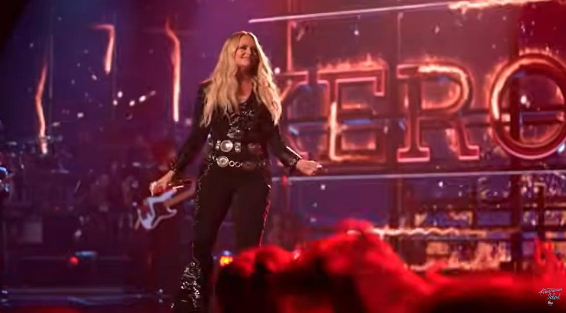 Miranda Lambert moves across the stage during her "American Idol" performance, with fiery visuals amplifying the energy of "Kerosene" | Source: YouTube/AmericanIdol