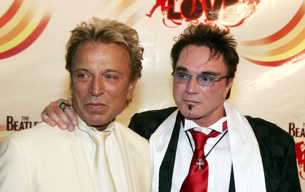 Siegfried Fischbacher and Roy Horn at the gala premiere of "The Beatles LOVE by Cirque du Soleil" on June 30, 2006, in Las Vegas, Nevada | Photo: Ethan Miller/Getty Images