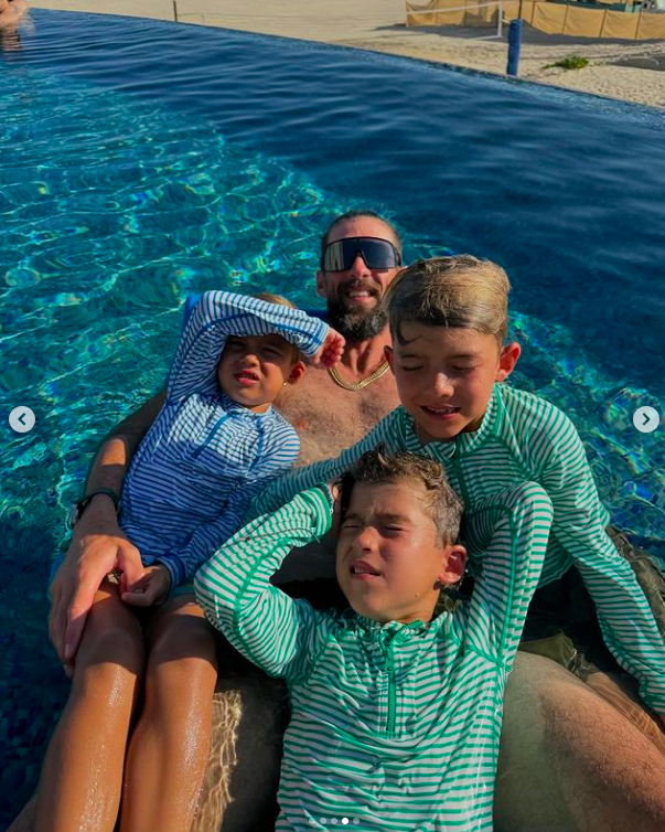 Michael Phelps posing for a picture with three of his sons, posted on July 1, 2024 | Source: Instagram/m_phelps00