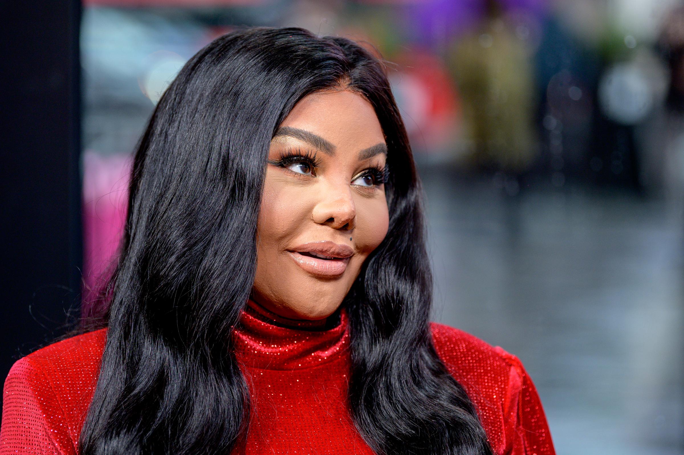 Lil' Kim visiting "Extra" in New York City on October 9, 2019. | Source: Getty Images