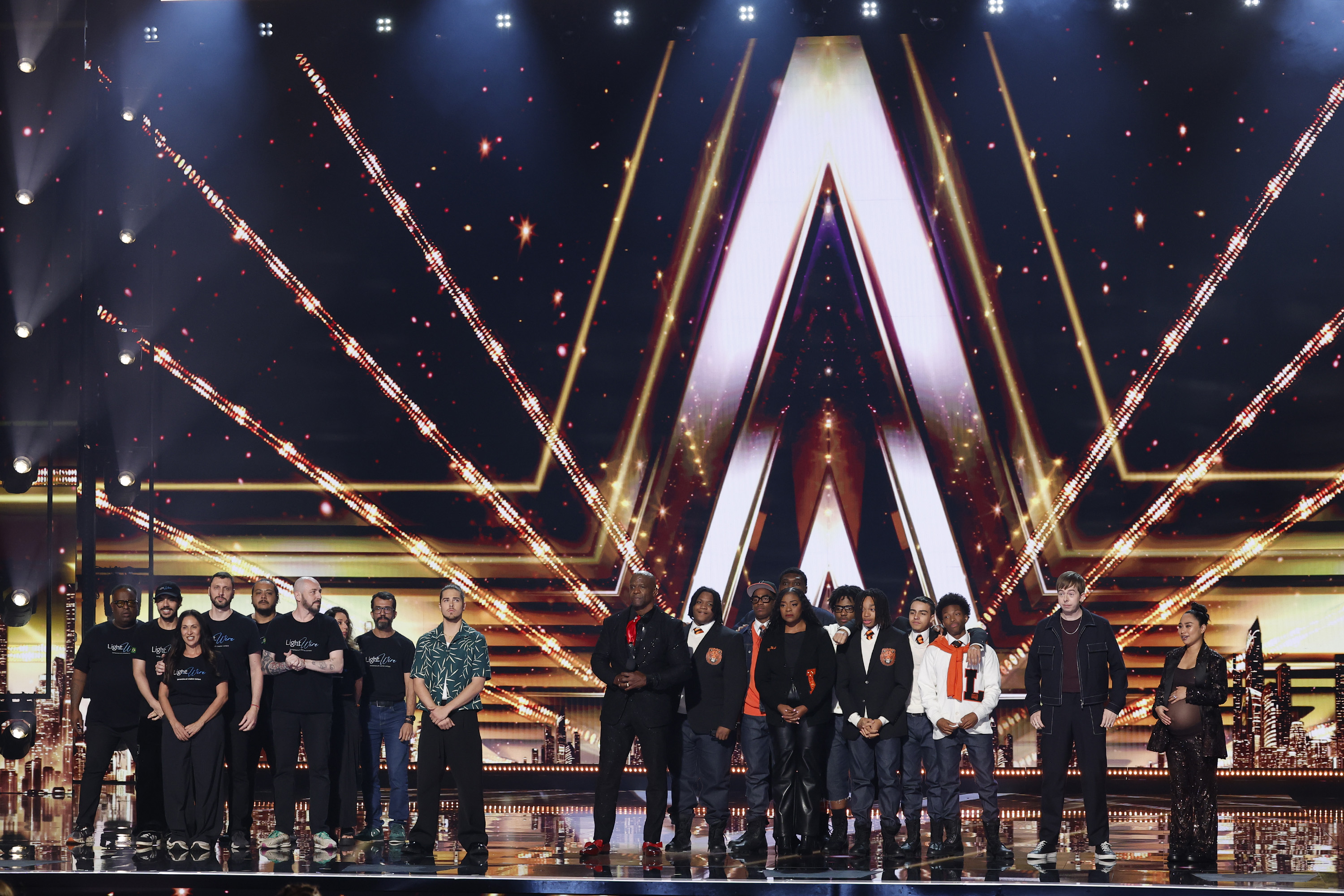 Light Wire, Jourdan Blue, Terry Crews, Leo High School Choir, Chris Turner, and Jessica Sanchez appear onstage during the Season 20 finale of "America's Got Talent" on September 24, 2025 | Source: Getty Images