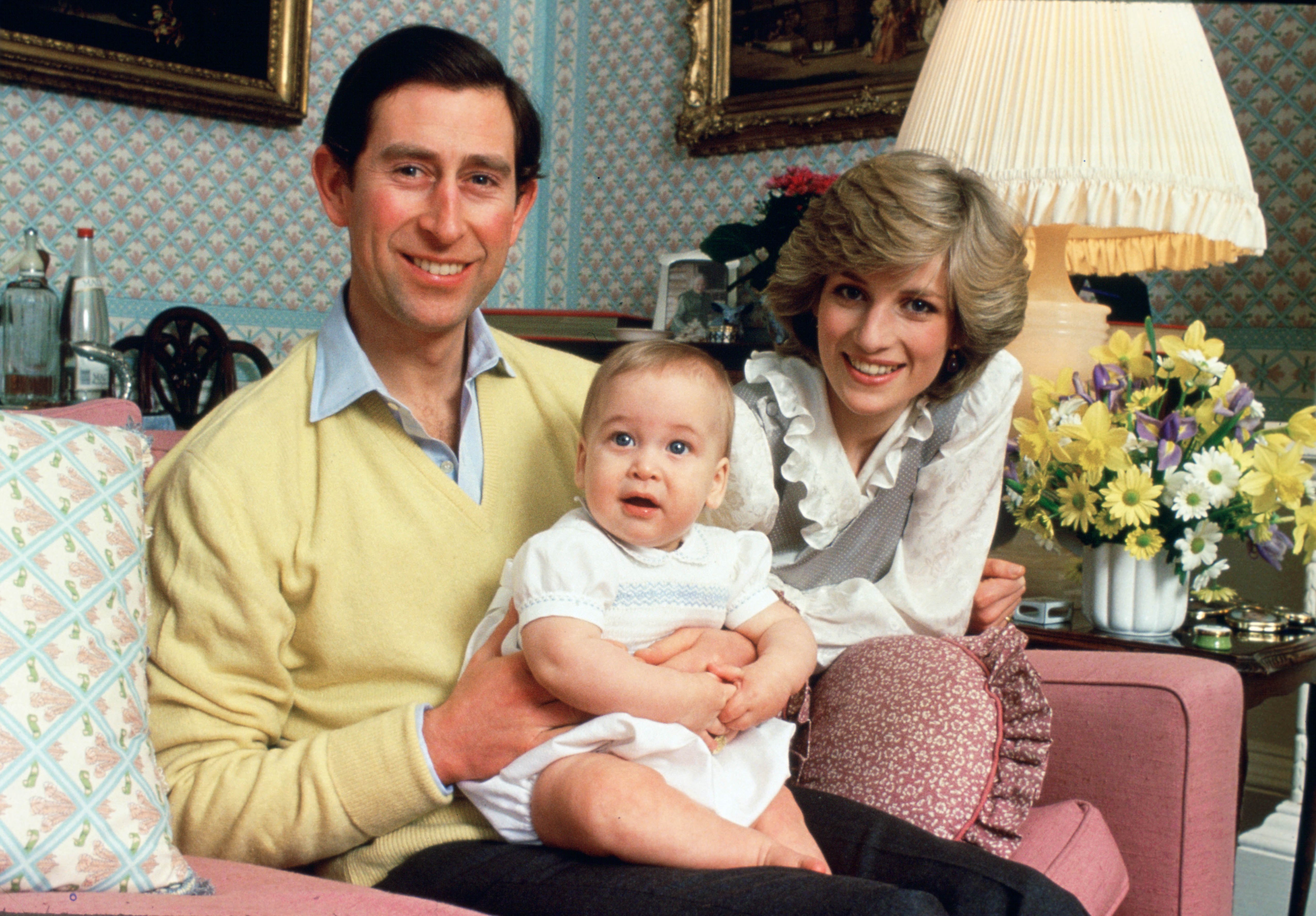  Prince Charles, Prince of Wales and Diana, Princess of Wales with their baby son, Prince William, at home in Kensington Palace. | Source: Getty Images