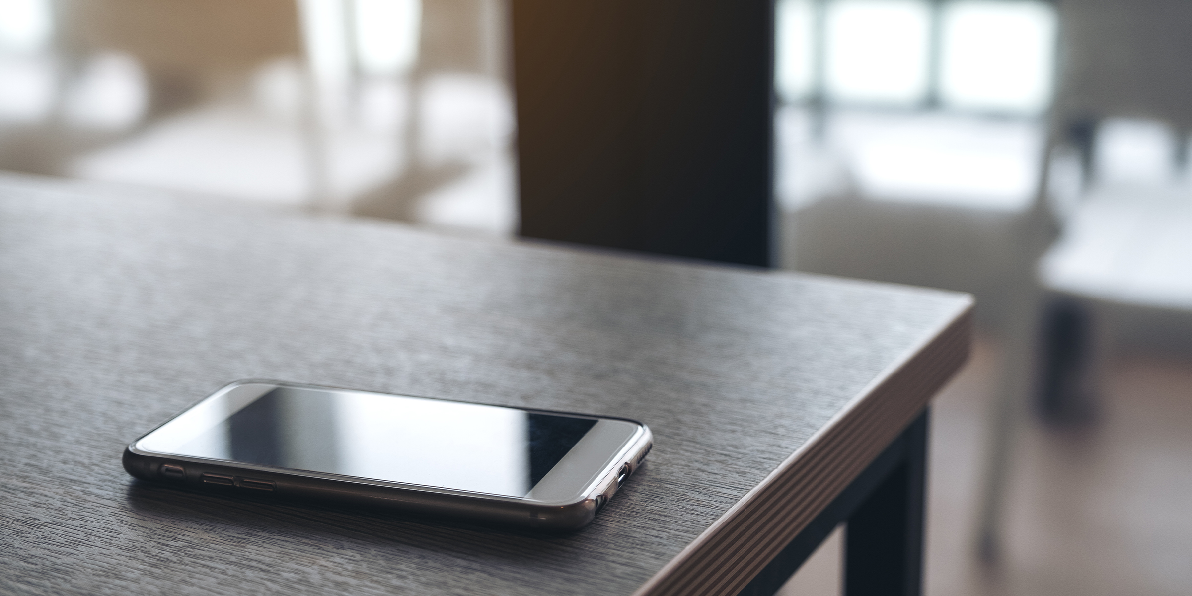 A smartphone on the table | Source: Shutterstock