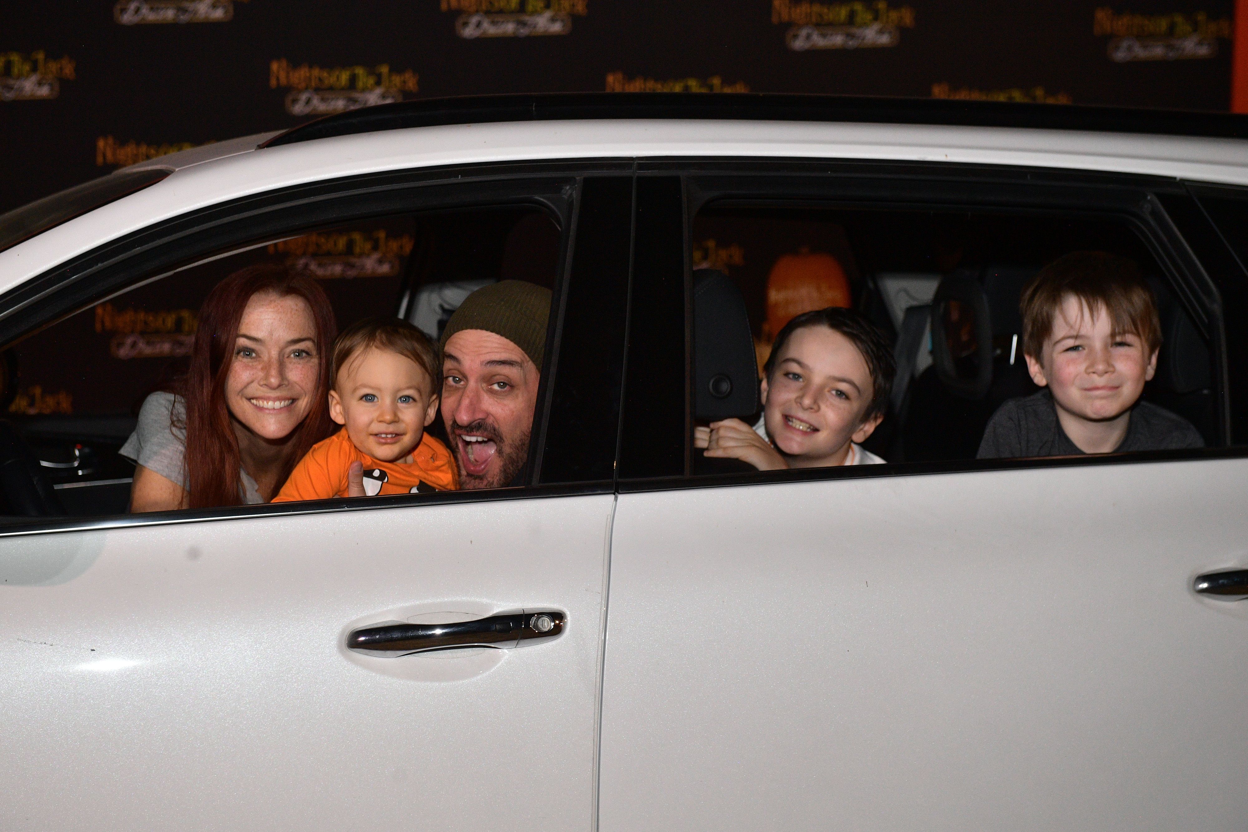 Annie Wersching and Stephen Full with their children attend "Nights of the Jack Friends & Family Night 2020" at King Gillette Ranch on September 30, 2020, in Calabasas, California. | Source: Getty Images