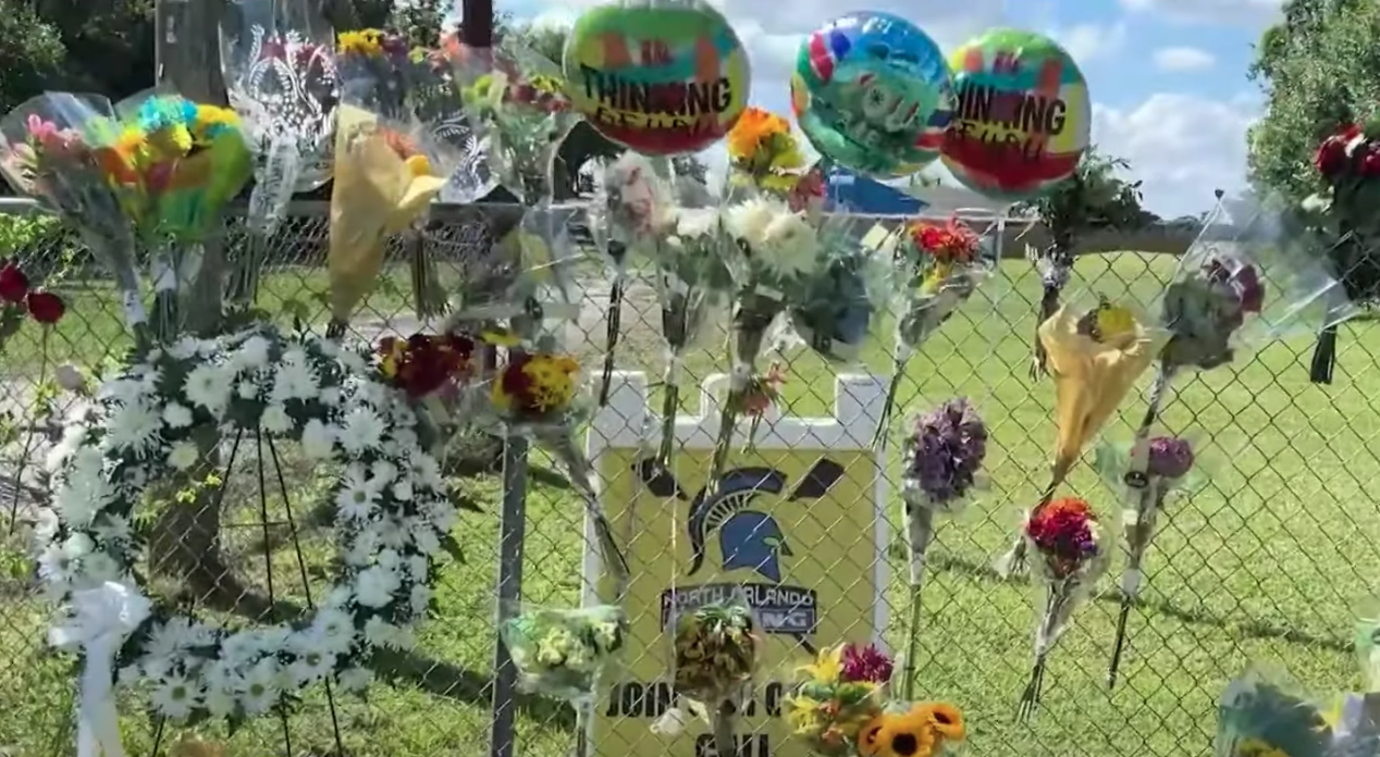 Balloons and flowers for Langston Rodriguez-Sane and Gavin Christman. | Source: youtube.com/WKMG News 6 ClickOrlando