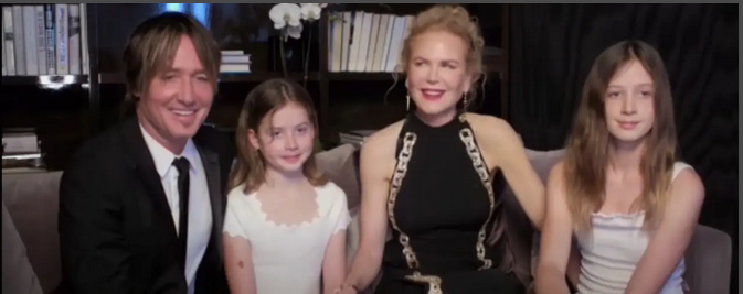 Keith Urban, Nicole Kidman, and their daughters Sunday and Faith at the Golden Globes Awards, from a video dated March 1, 2021 | Source: youtube.com/@EntertainmentTonight