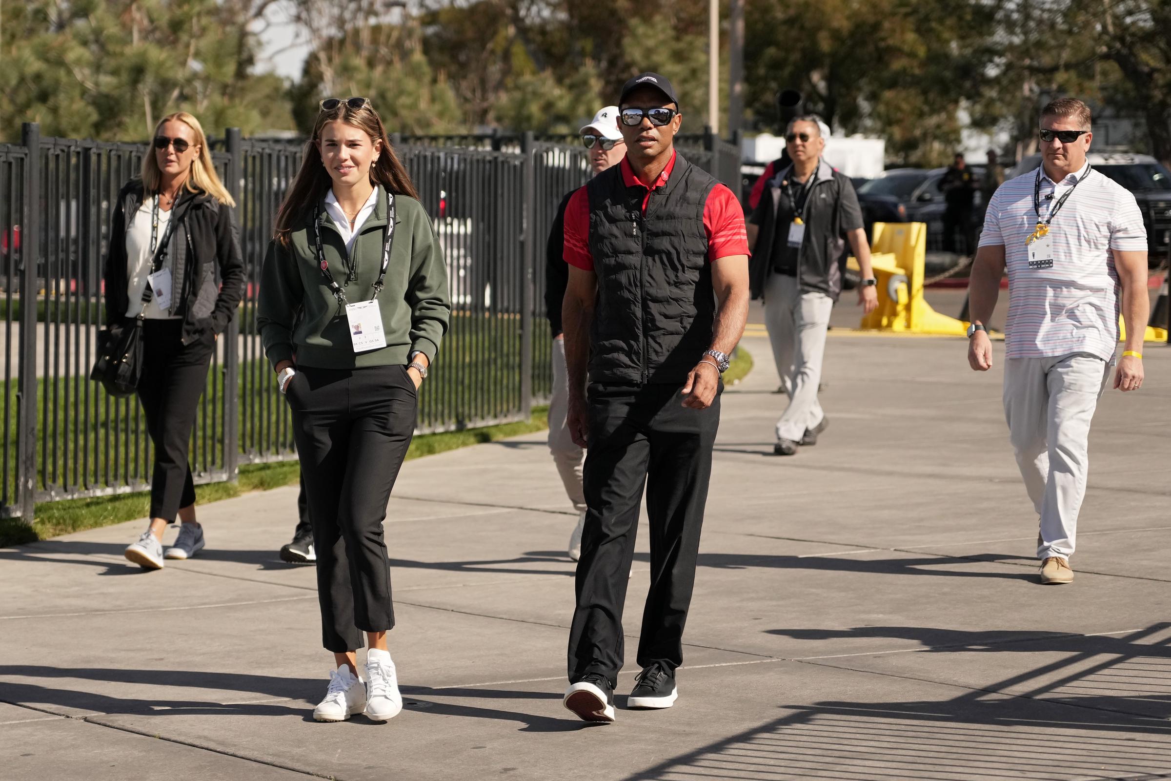 Kai Trump and Tiger Woods arriving at the course during the final round of The Genesis Invitational 2025 at Torrey Pines Golf Course on February 16 in La Jolla, California. | Source: Getty Images