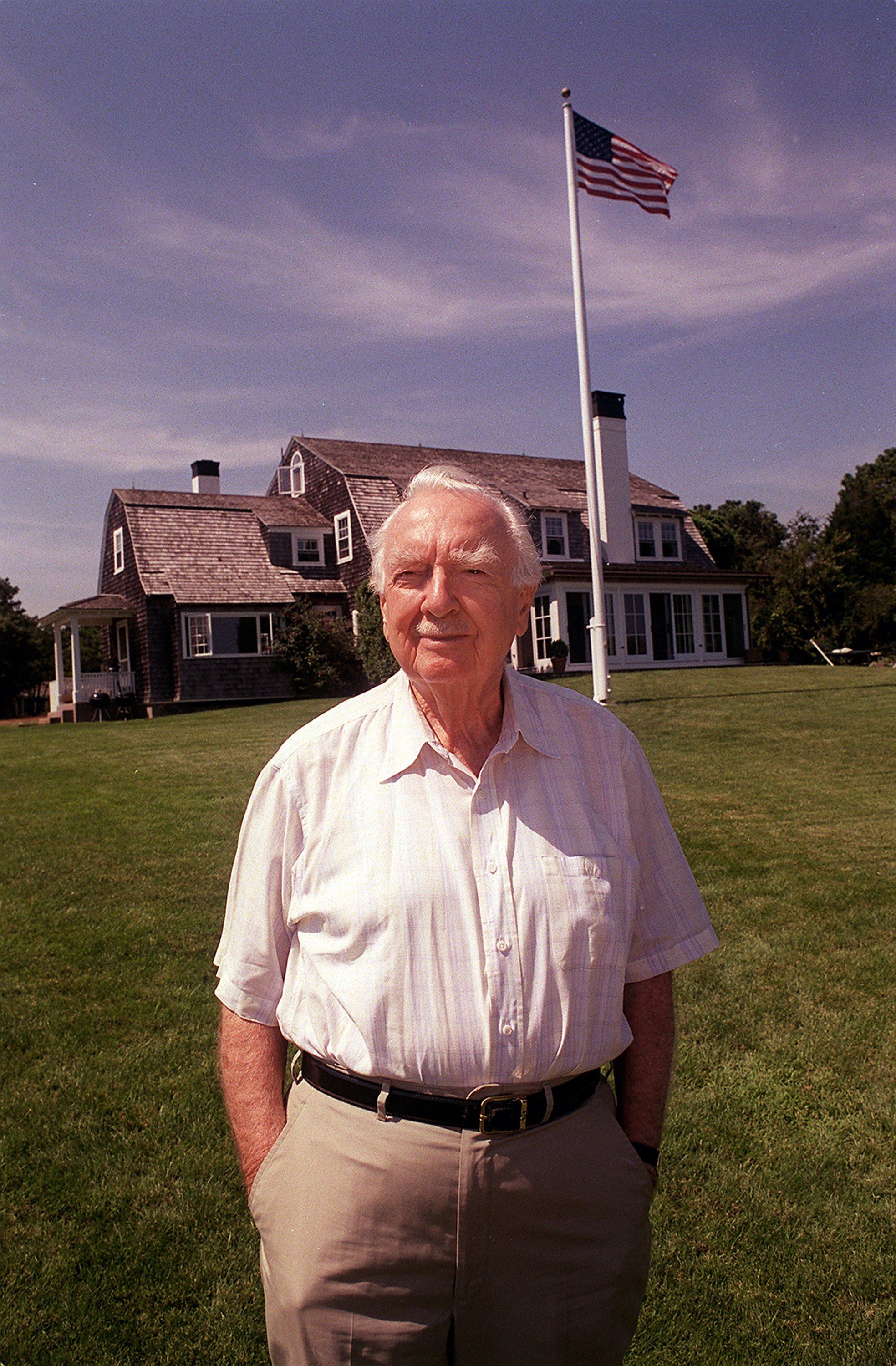 Walter Cronkite poses in front of his home August 29, 2003 in Edgartown, Massachusetts. News anchorman Walter Cronkite died at the age of 92 on July 17, 2009 at his home in New York. | Source: Getty Images